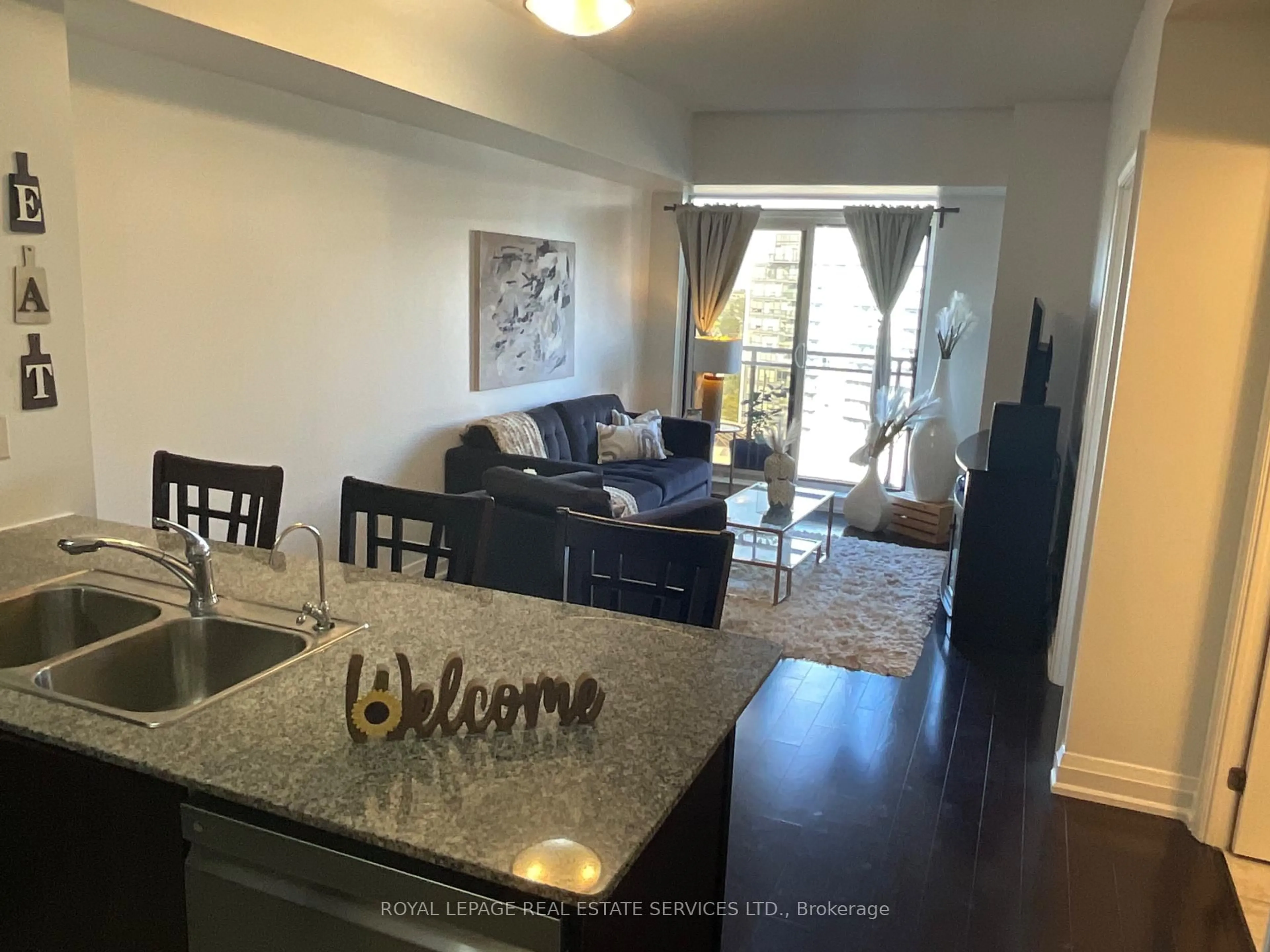 Living room with furniture, unknown for 55 De Boers Dr #1203, Toronto Ontario M3J 0G5
