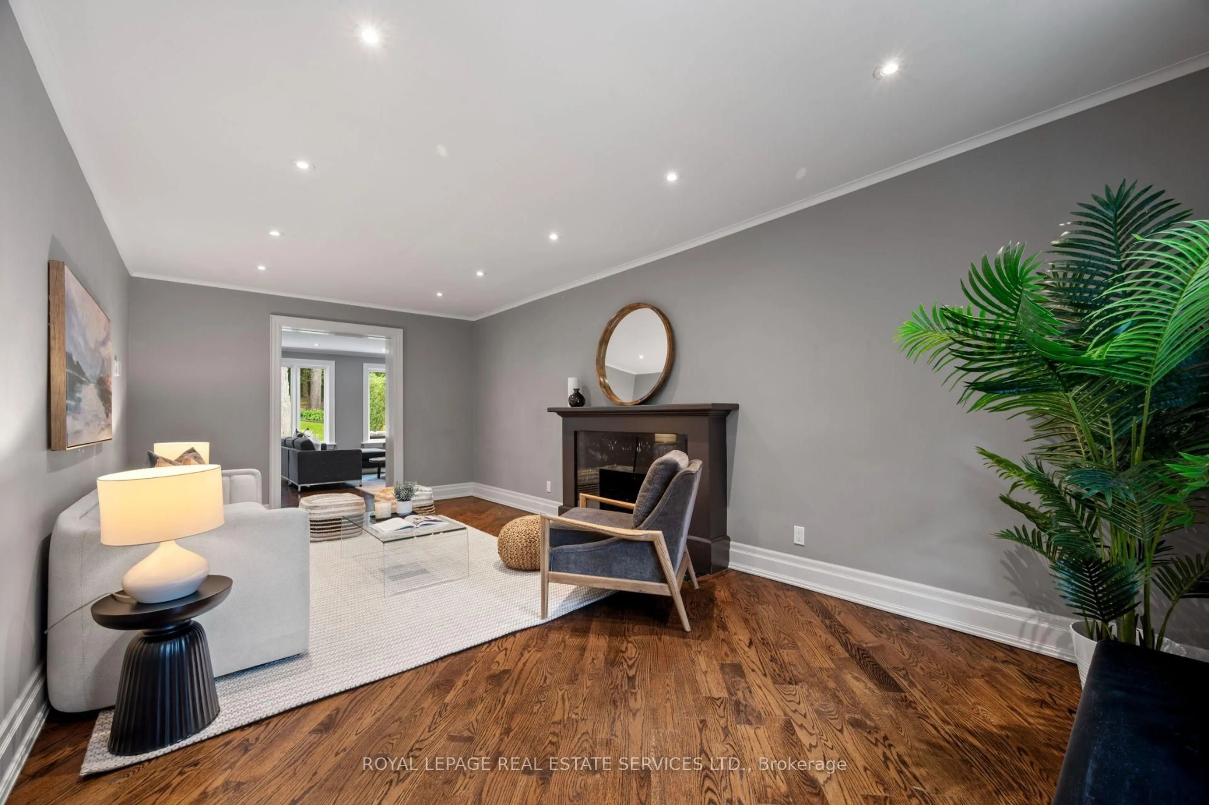 Living room with furniture, wood/laminate floor for 244 The Kingsway, Toronto Ontario M9A 3T5