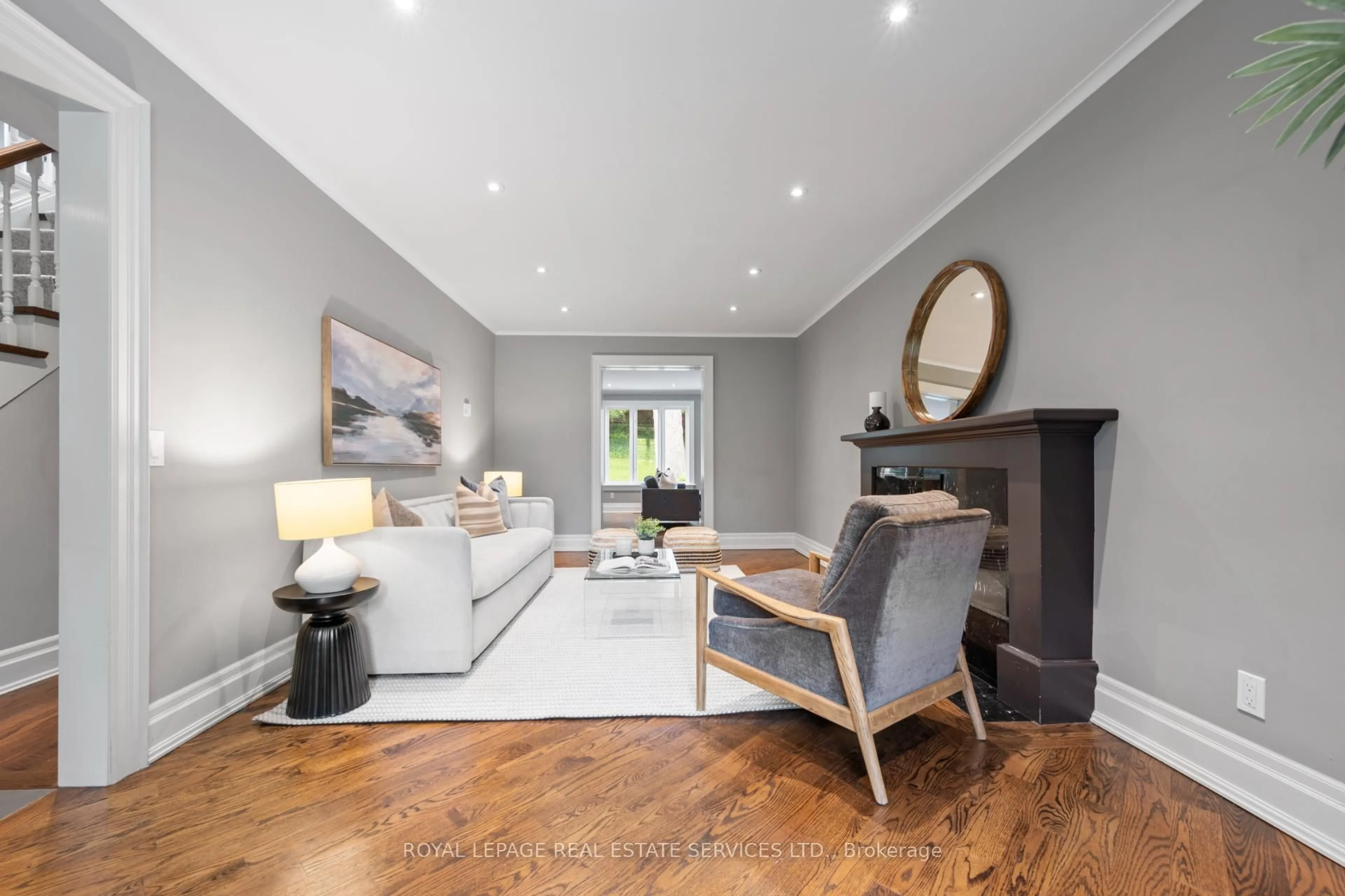 Living room with furniture, wood/laminate floor for 244 The Kingsway, Toronto Ontario M9A 3T5