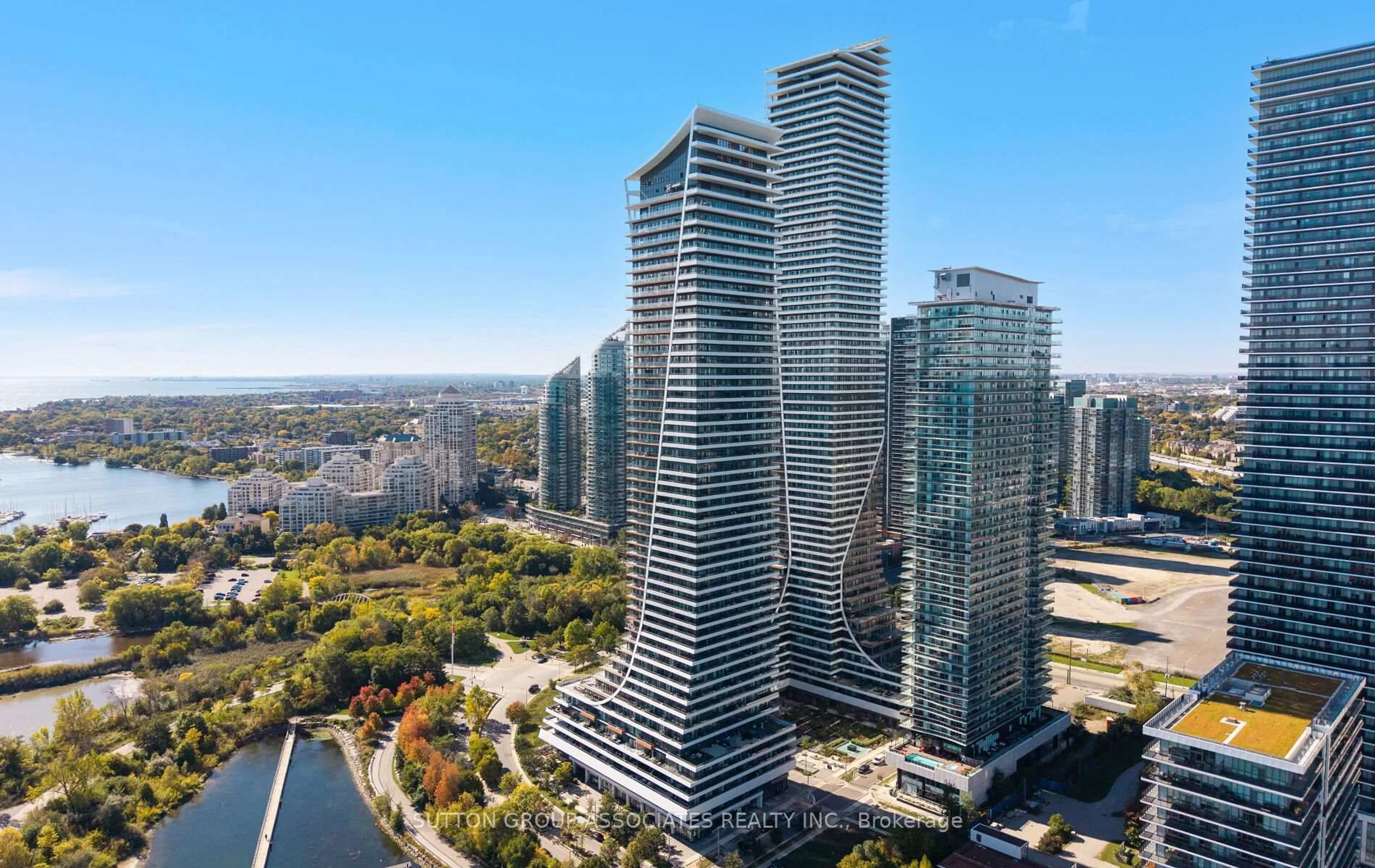 A pic from outside/outdoor area/front of a property/back of a property/a pic from drone, city buildings view from balcony for 20 Shore Breeze Dr #703, Toronto Ontario M8V 0C7