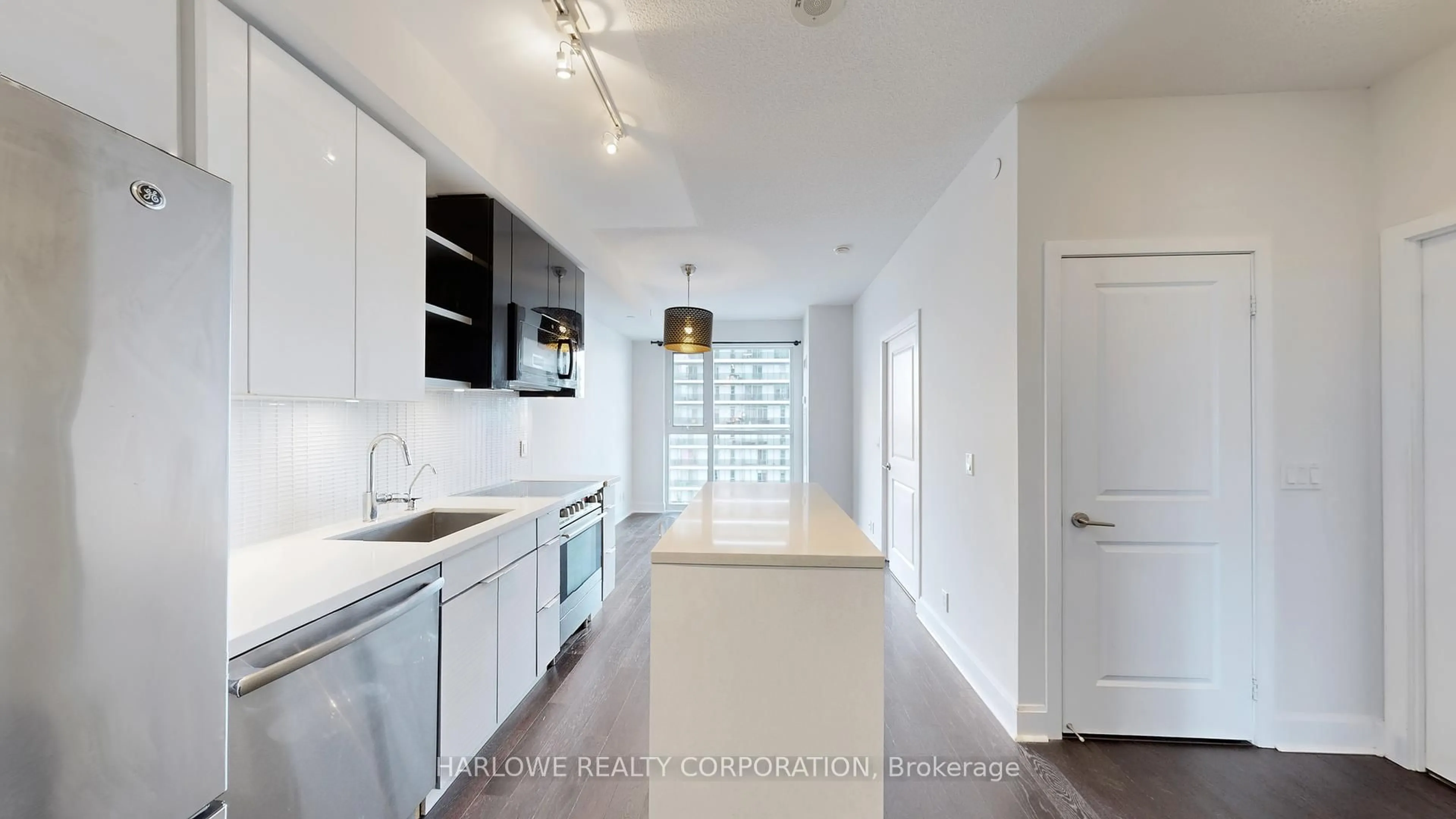 Open concept kitchen, unknown for 33 Shore Breeze Dr #2006, Toronto Ontario M8V 1A1