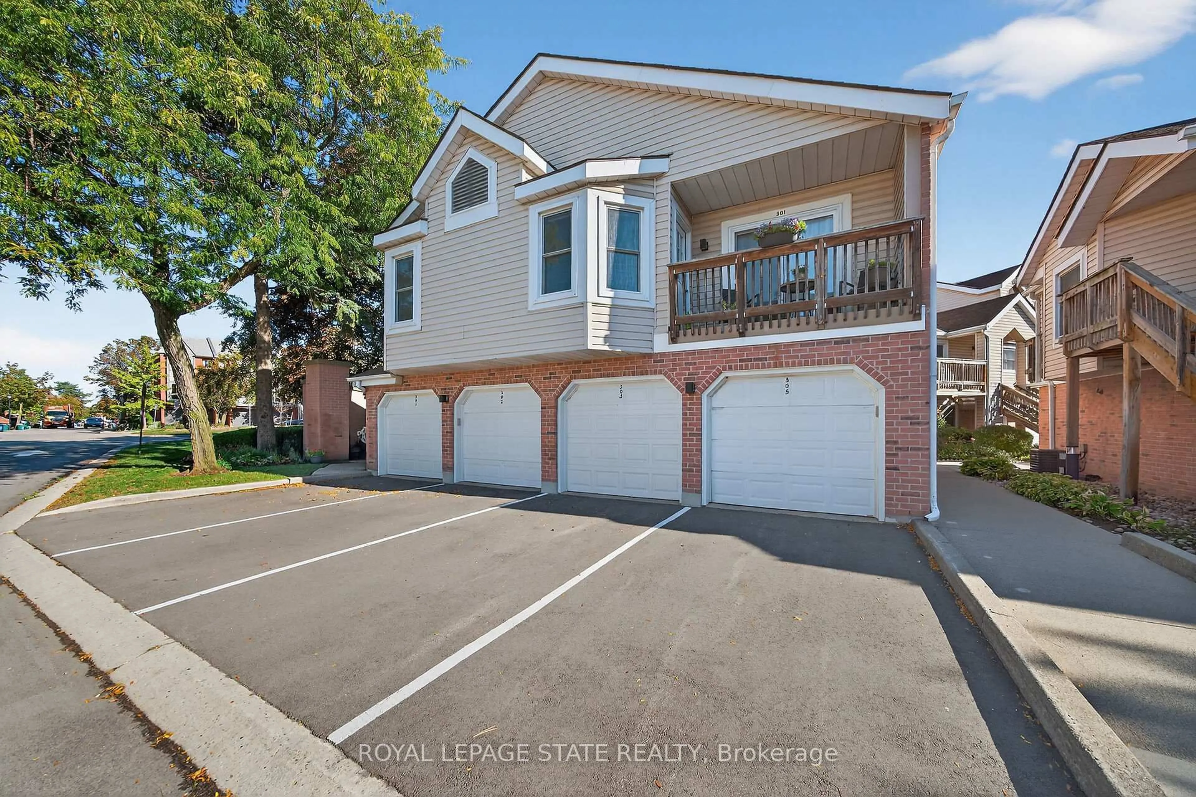 A pic from outside/outdoor area/front of a property/back of a property/a pic from drone, street for 1210 Thorpe Rd #301, Burlington Ontario L7S 2G7