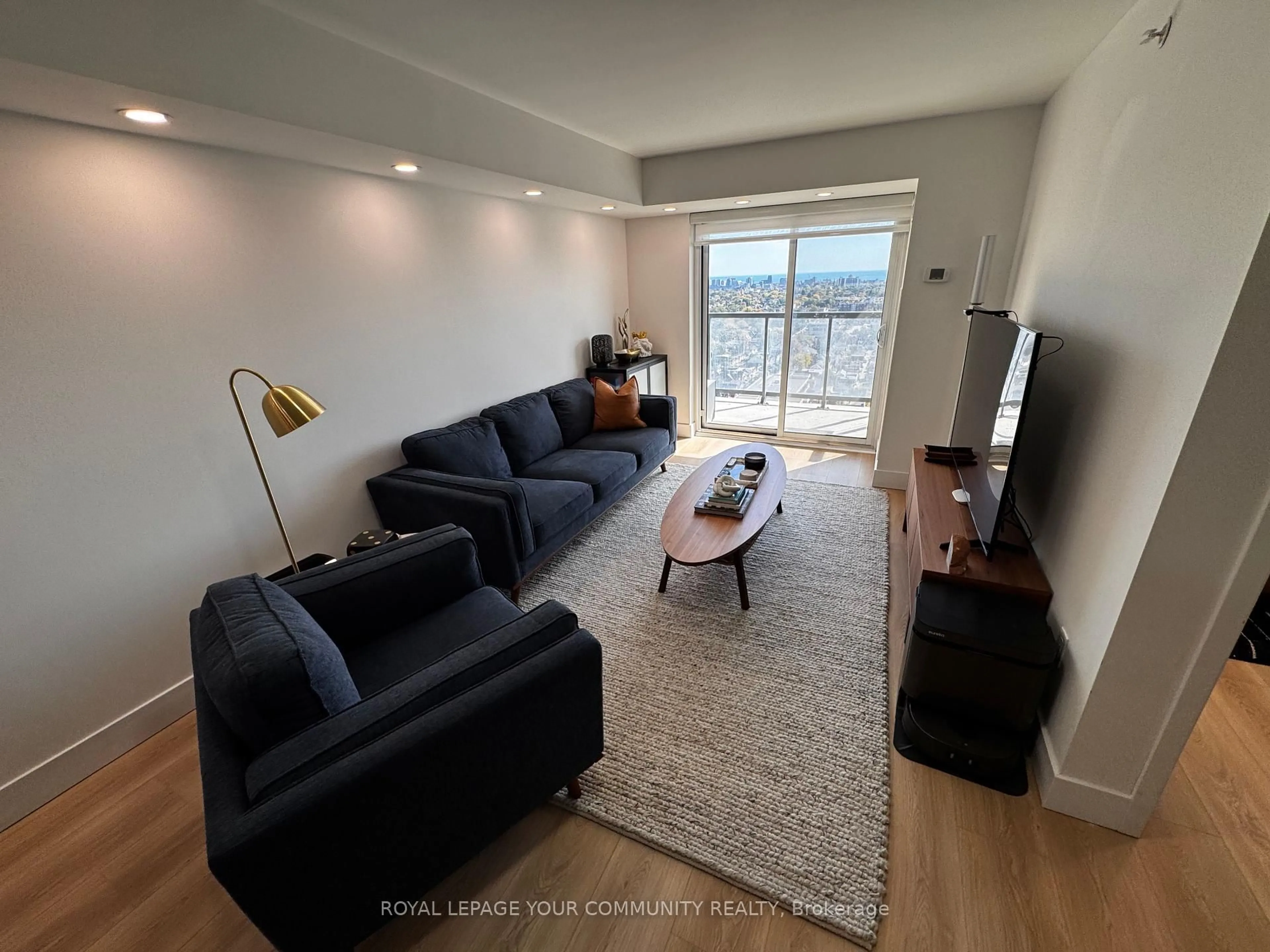 Living room with furniture, wood/laminate floor for 1410 Dupont St #2505, Toronto Ontario M6H 0B6