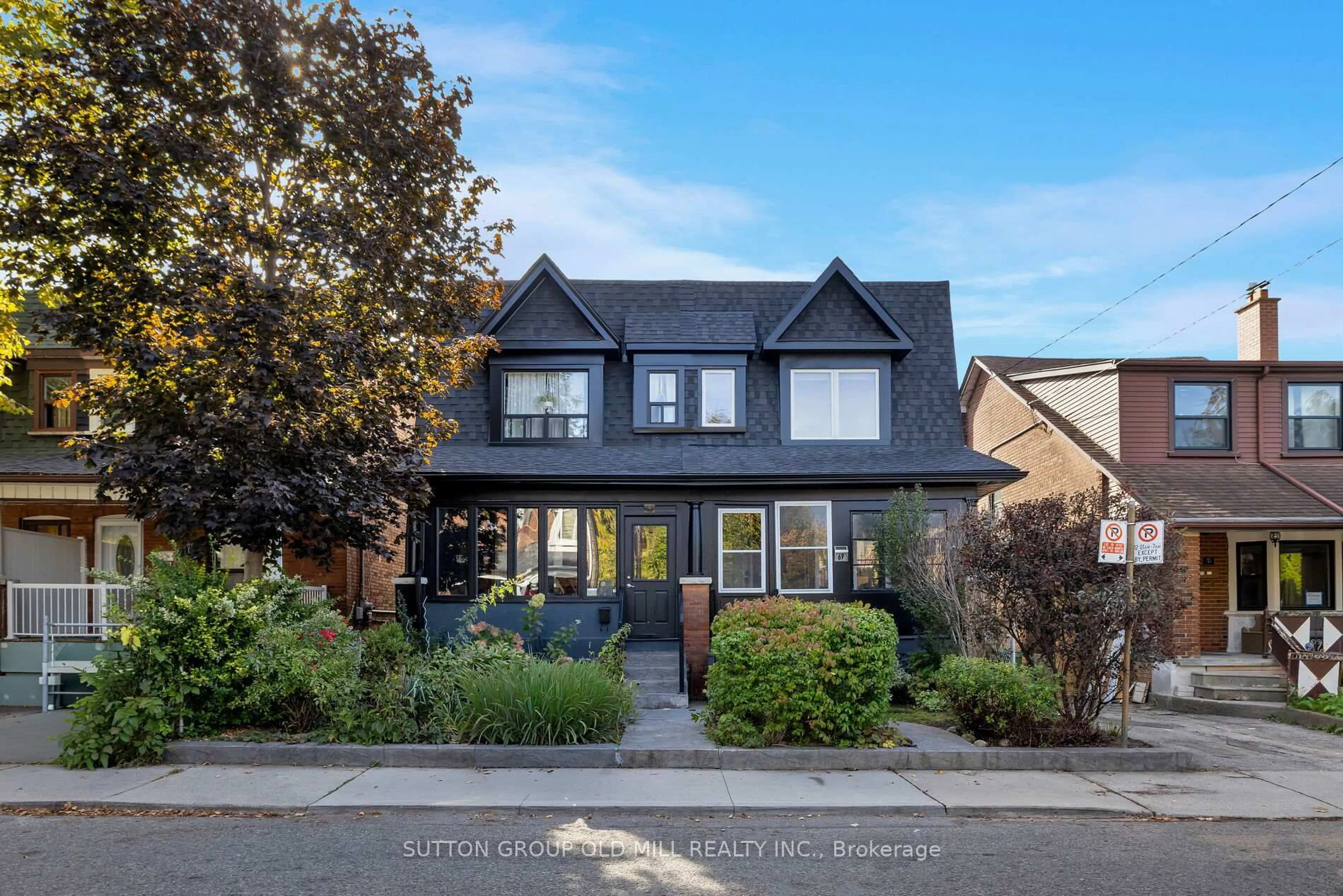 Home with brick exterior material, street for 69 Peterborough Ave, Toronto Ontario M6H 2L2