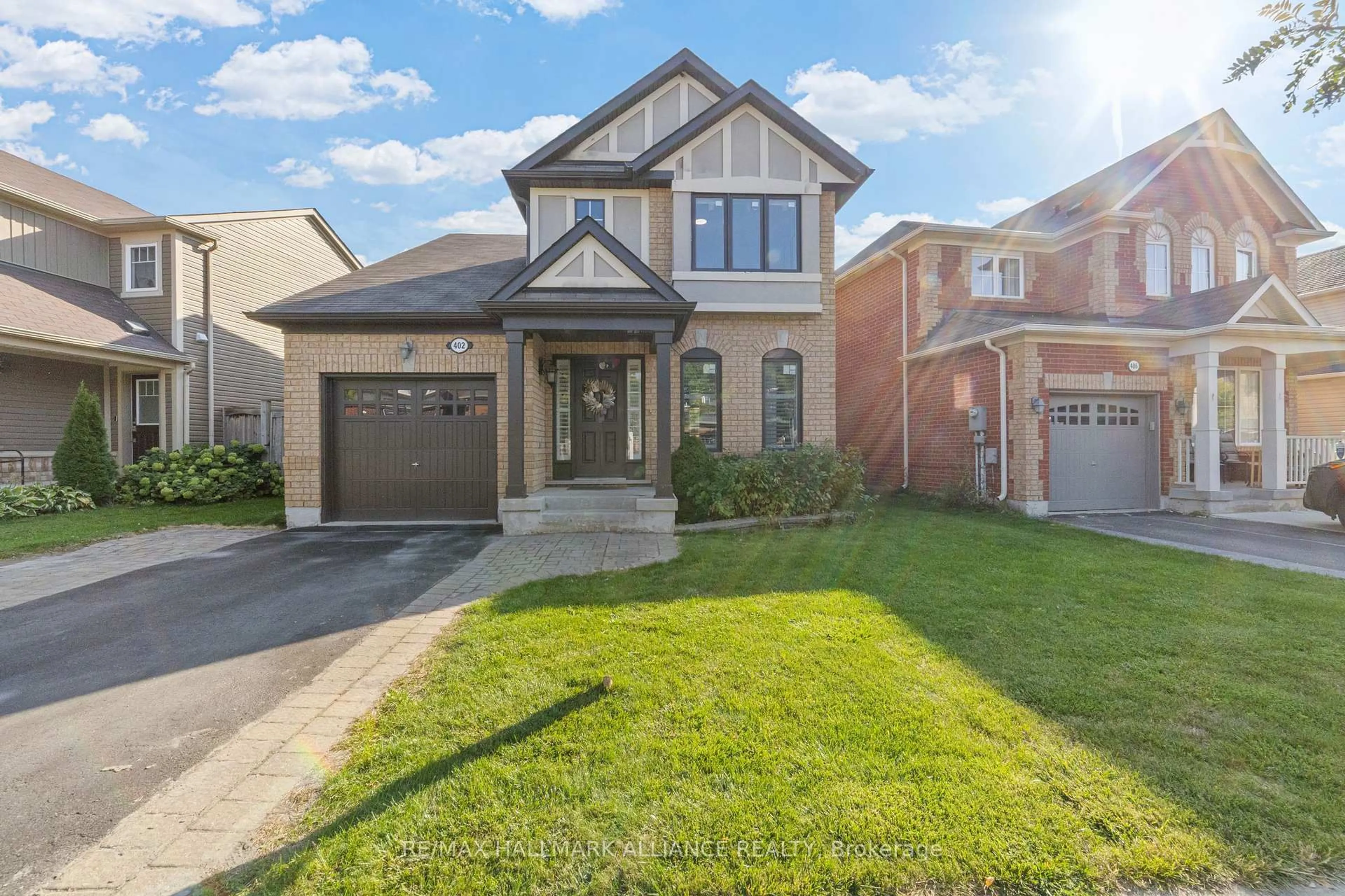 Home with brick exterior material, street for 402 Schreyer Cres, Milton Ontario L9T 7T2