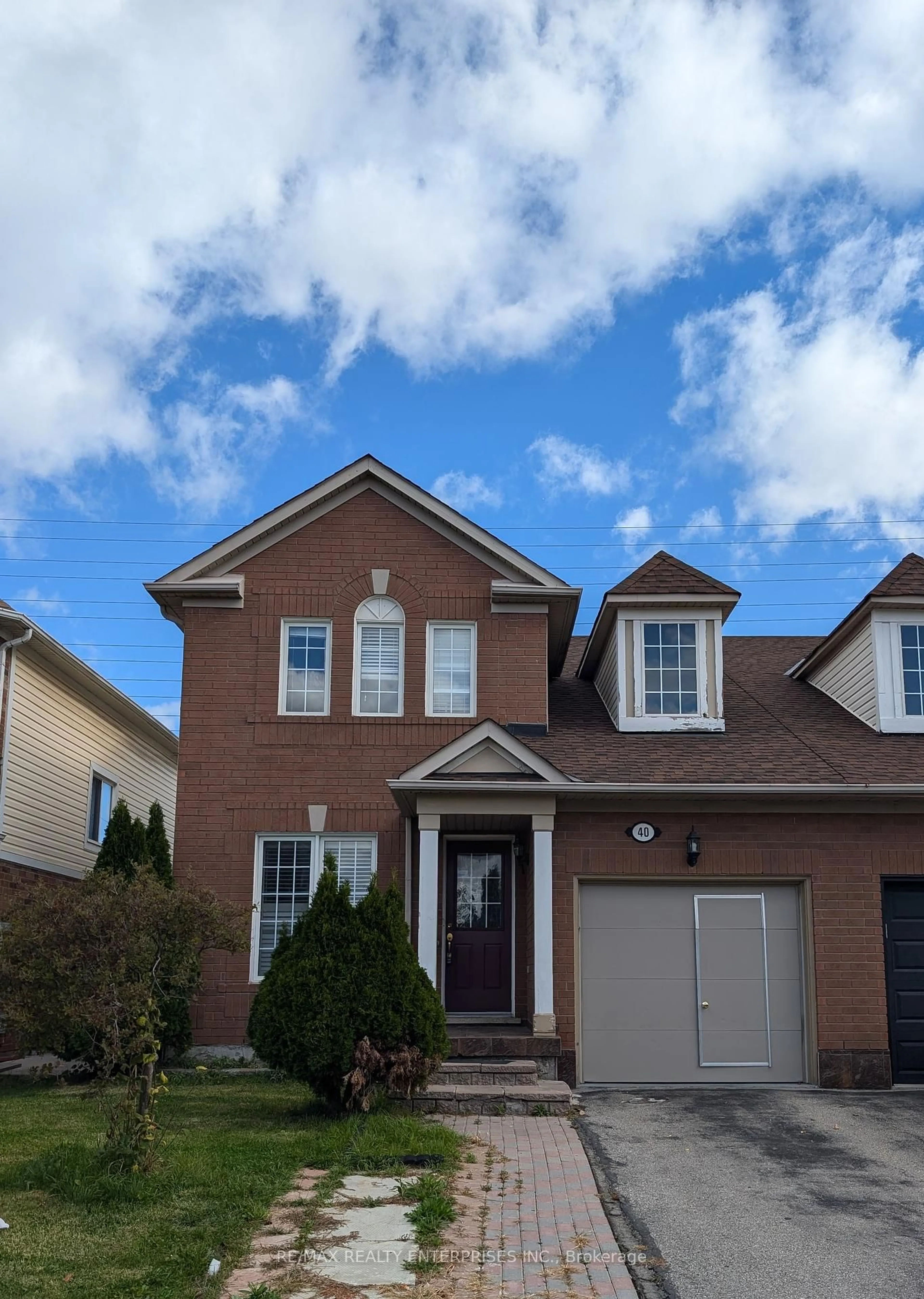 Home with brick exterior material, street for 40 Sweetwood Circ, Brampton Ontario L7A 2X7