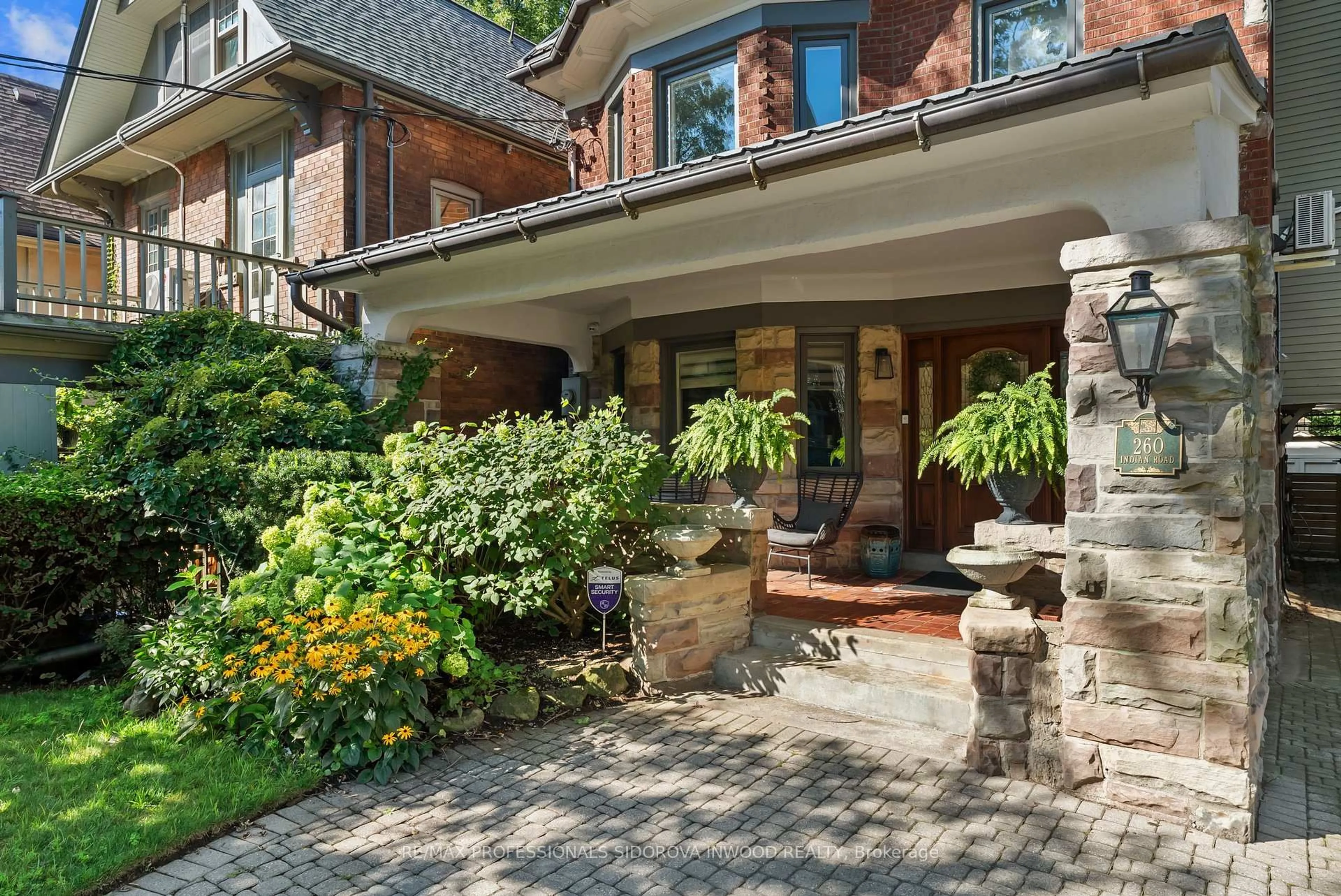 Home with brick exterior material, street for 260 Indian Rd, Toronto Ontario M6R 2X2