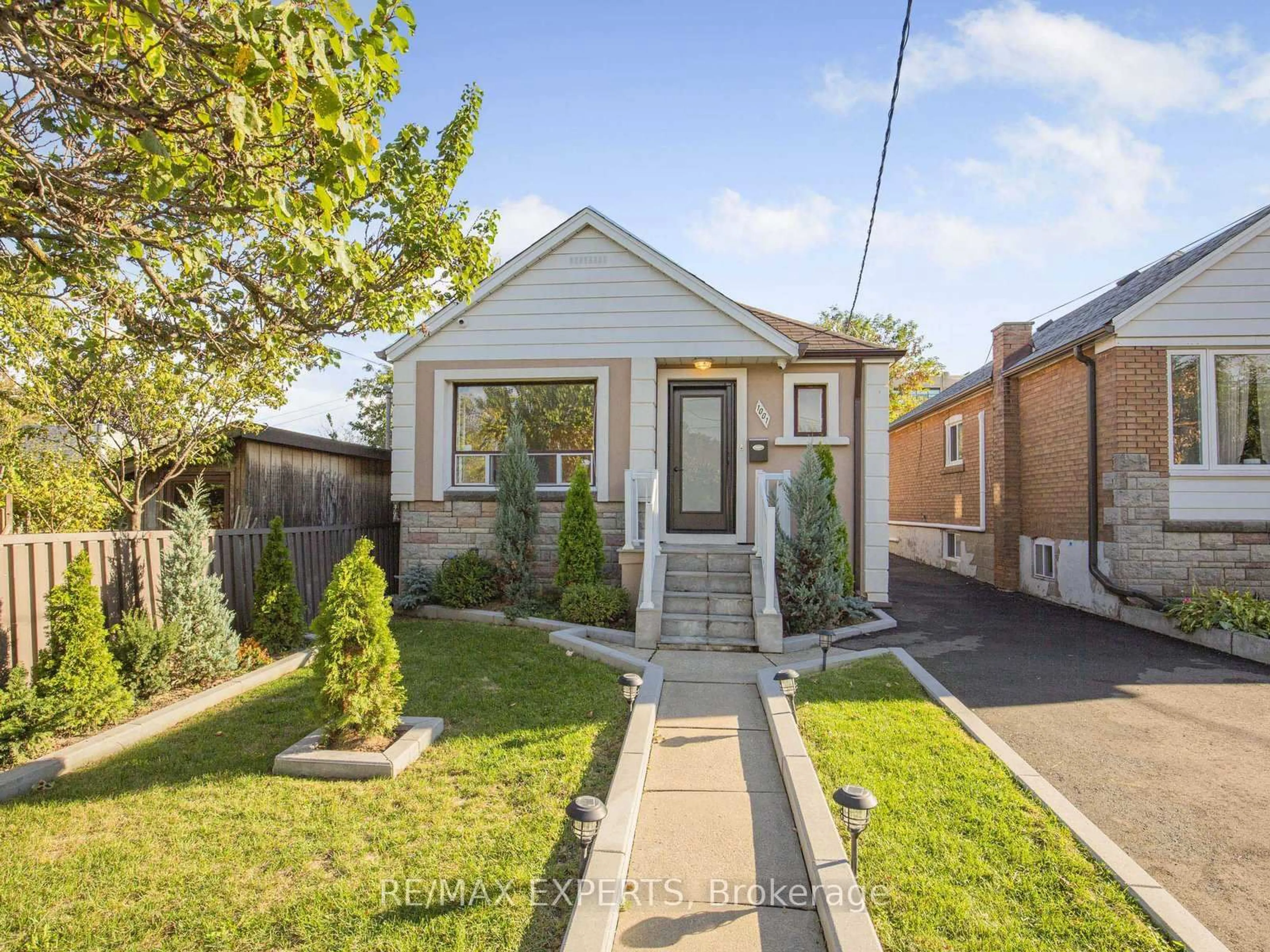 Home with brick exterior material, street for 1001 Castlefield Ave, Toronto Ontario M6B 1E4