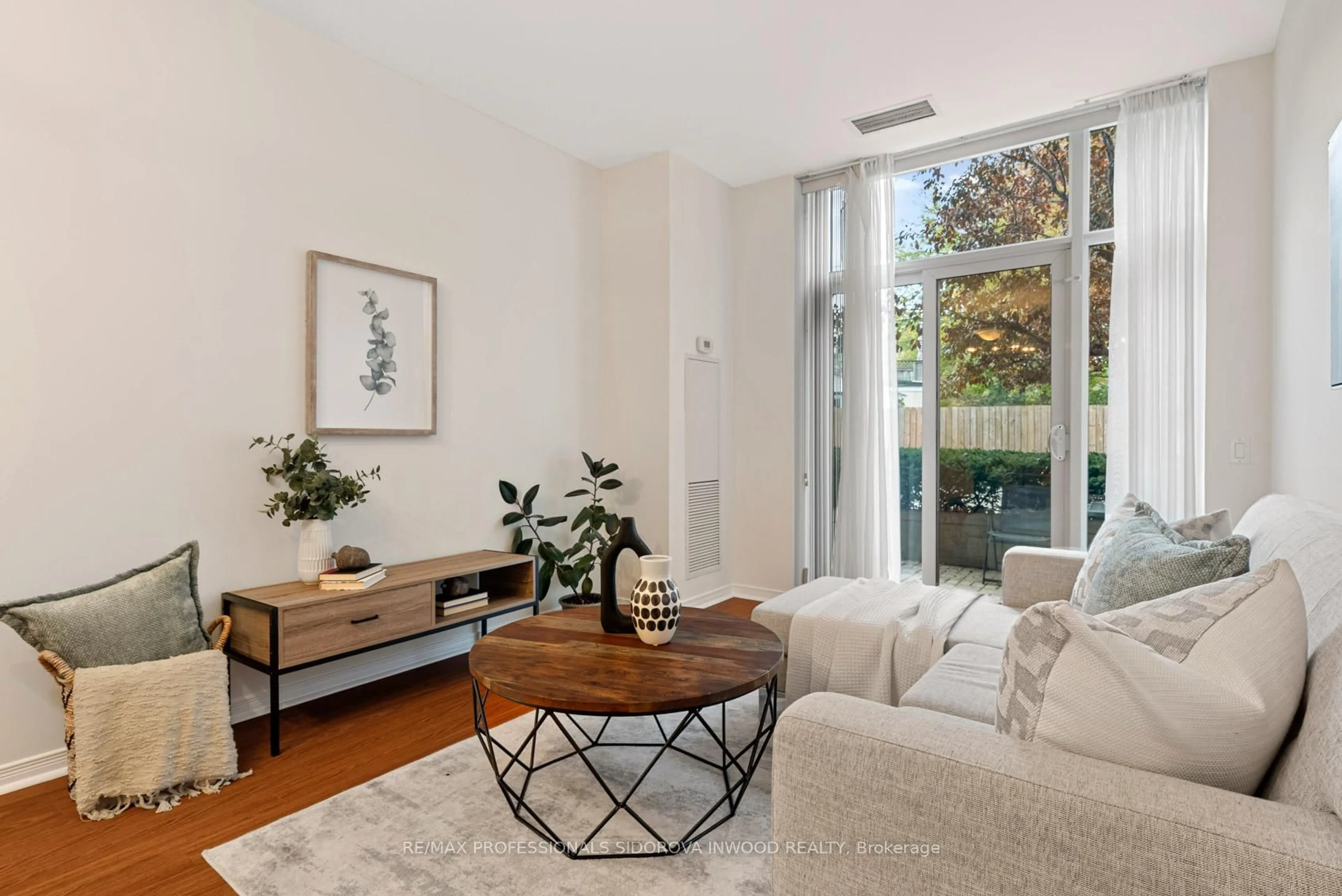 Living room with furniture, unknown for 61 Heintzman St #107, Toronto Ontario M6P 5A2