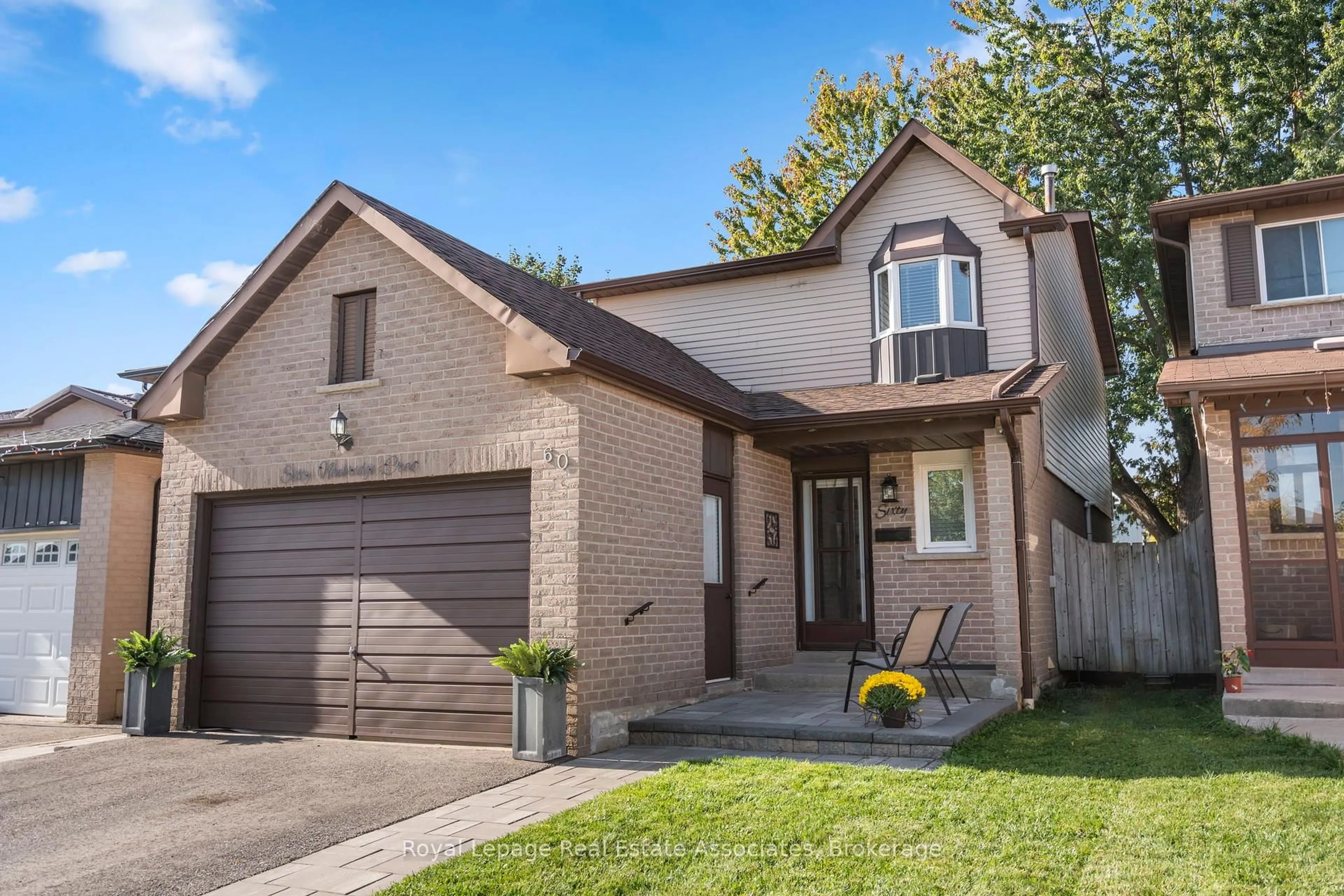 Home with brick exterior material, street for 60 Newbridge Cres, Brampton Ontario L6S 4B3