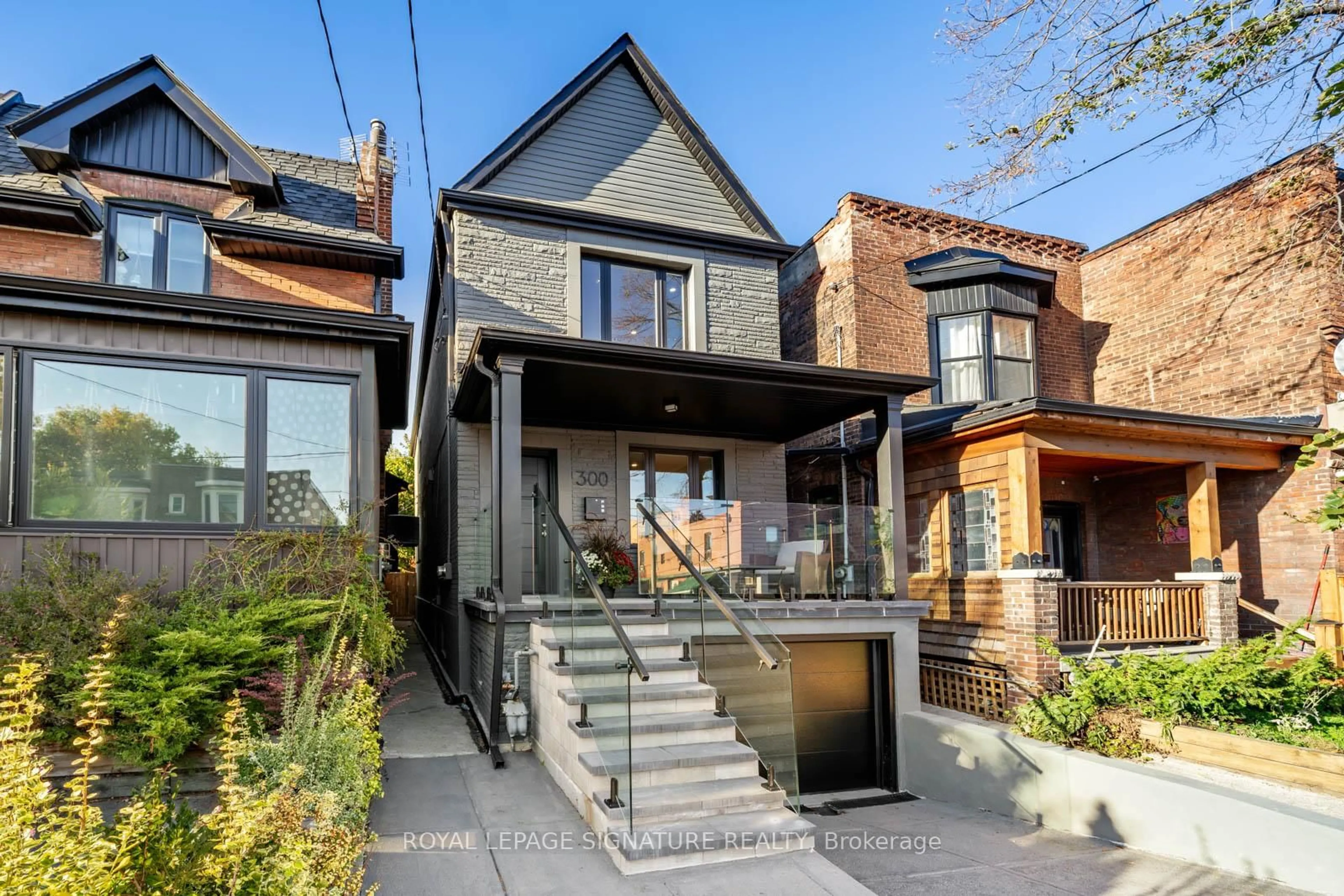 Home with brick exterior material, street for 300 Wallace Ave, Toronto Ontario M6P 3N4