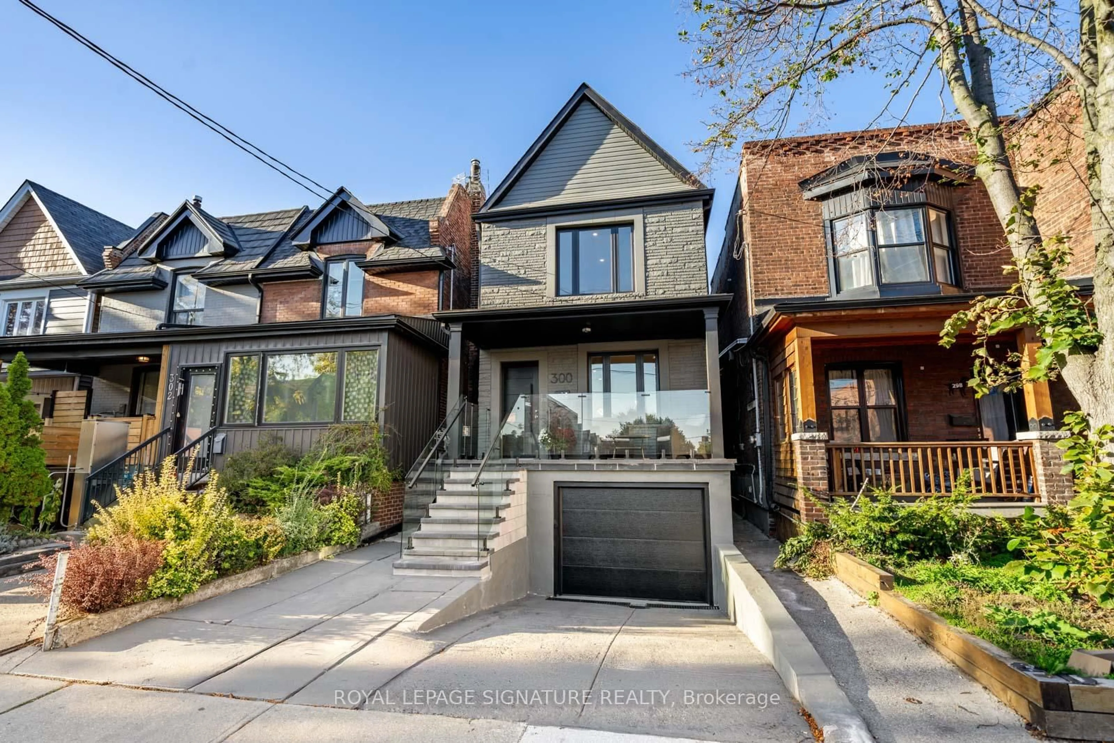 Home with brick exterior material, street for 300 Wallace Ave, Toronto Ontario M6P 3N4