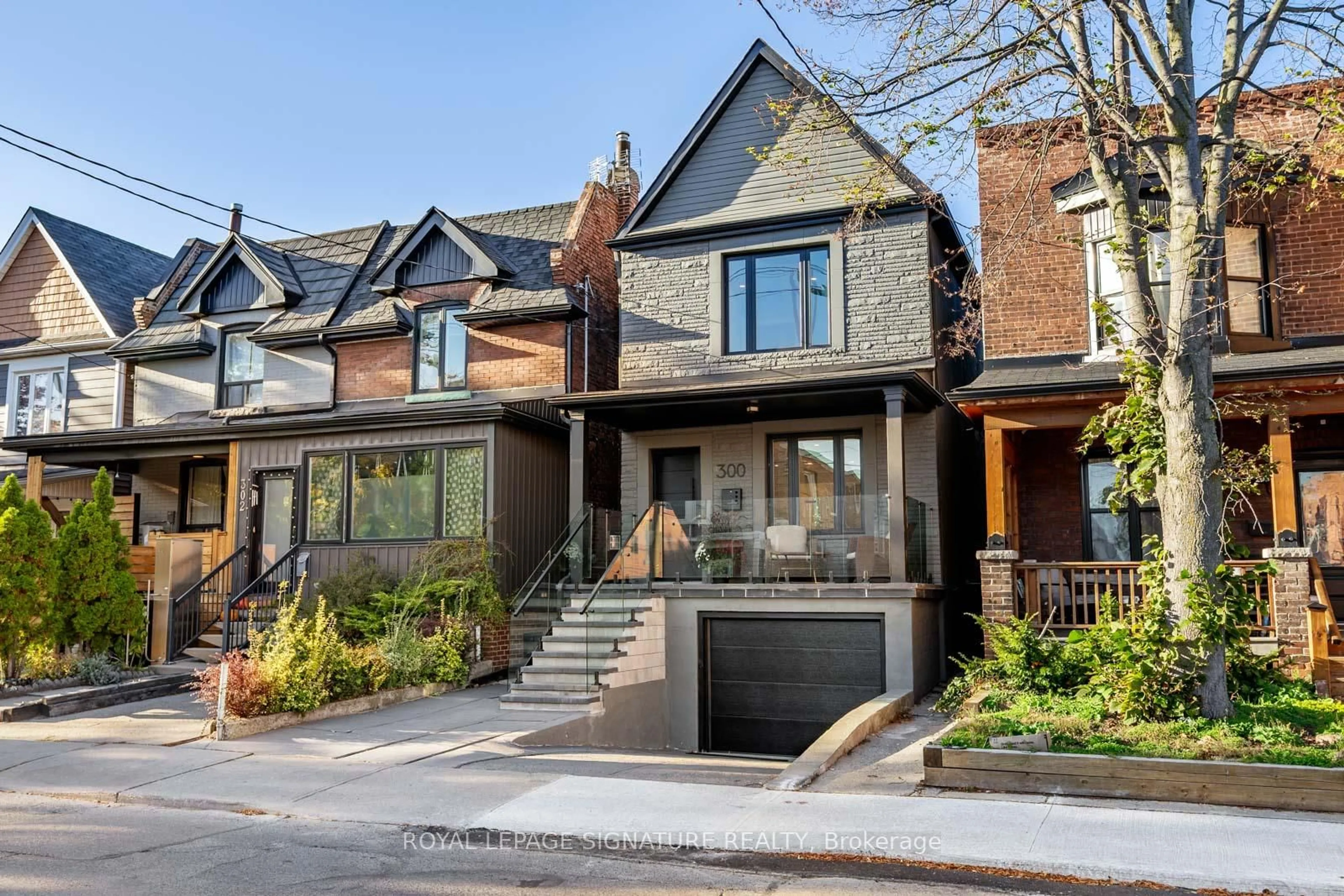 Home with brick exterior material, street for 300 Wallace Ave, Toronto Ontario M6P 3N4
