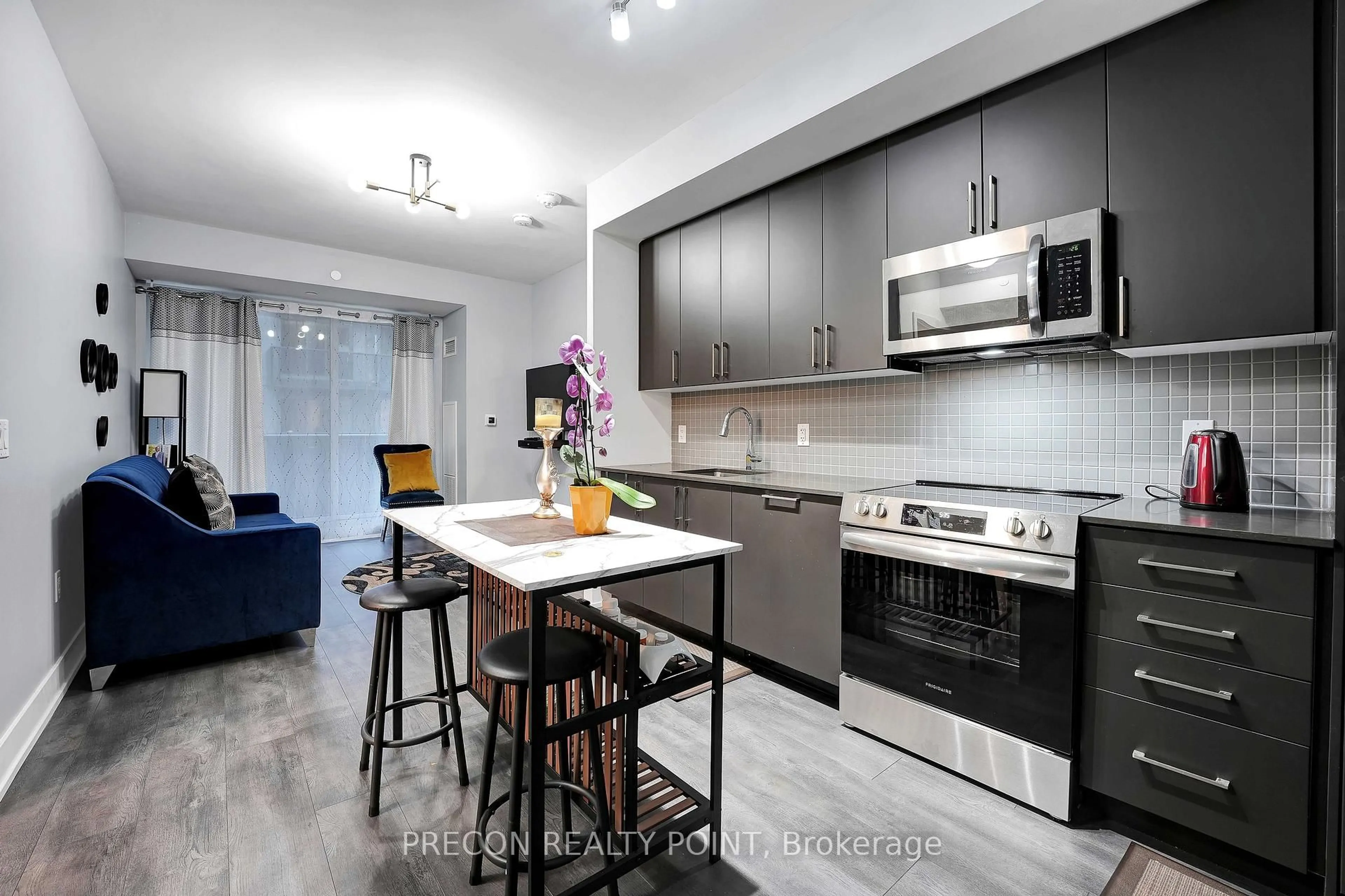 Open concept kitchen, unknown for 2450 Old Bronte Rd #322, Oakville Ontario L5M 5P6