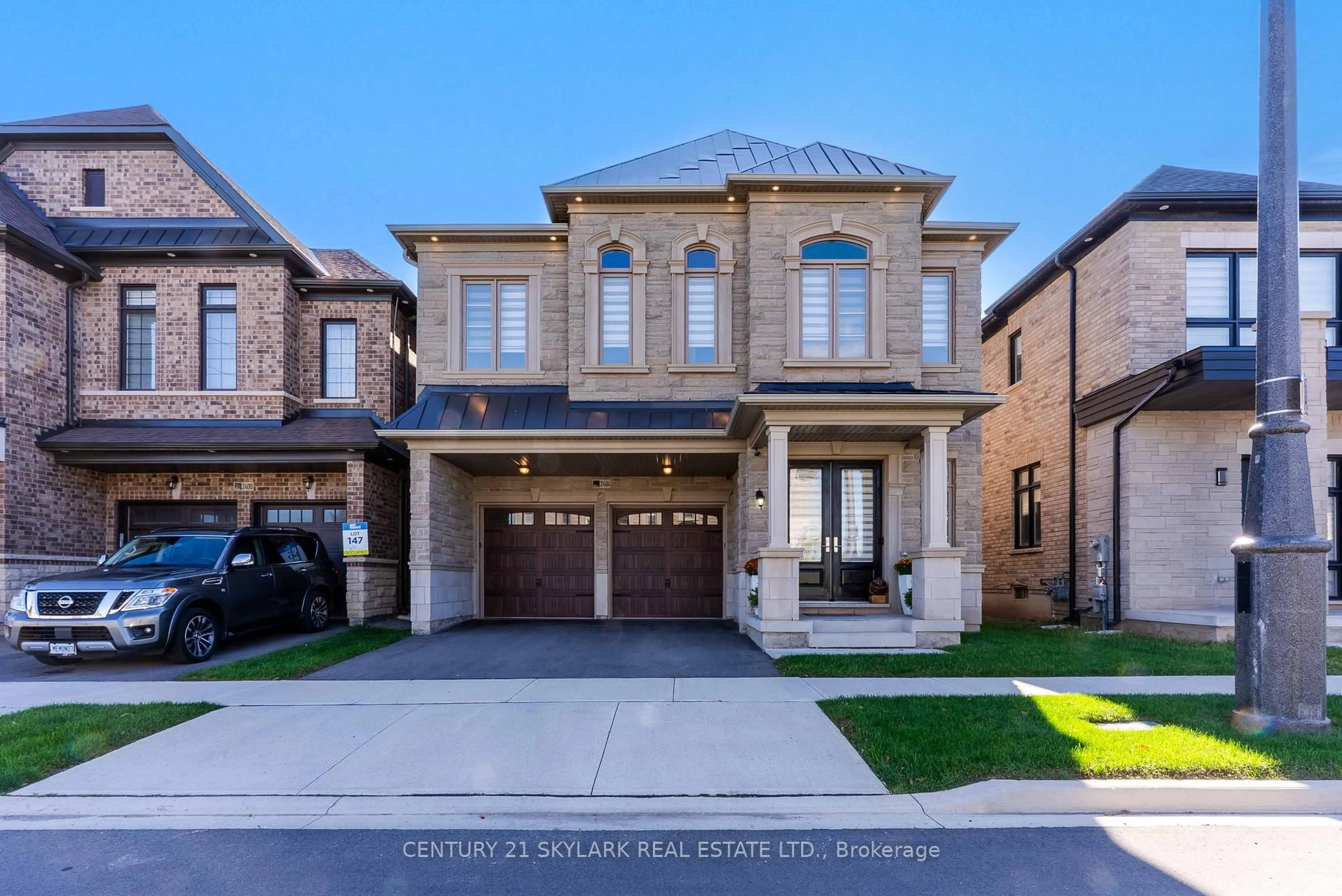 Home with brick exterior material, street for 2404 Edward Leaver Tr, Oakville Ontario L6M 5M2