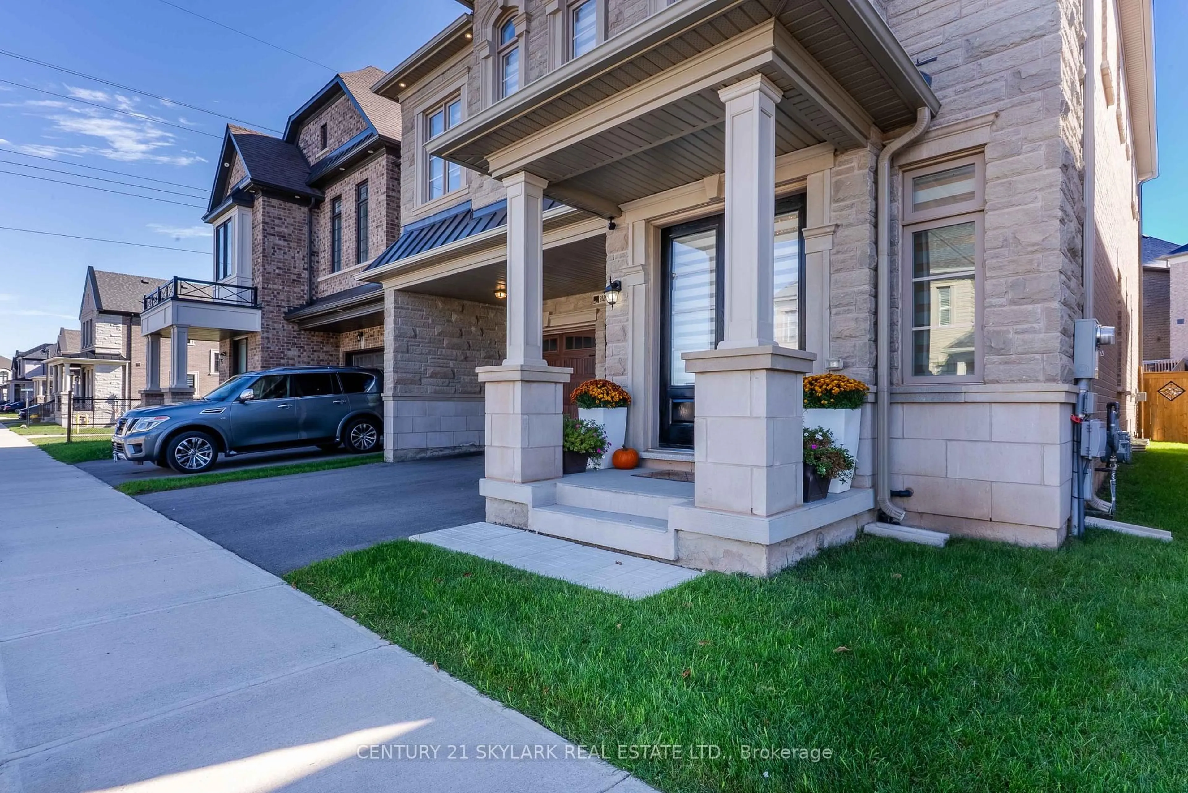 Home with brick exterior material, street for 2404 Edward Leaver Tr, Oakville Ontario L6M 5M2