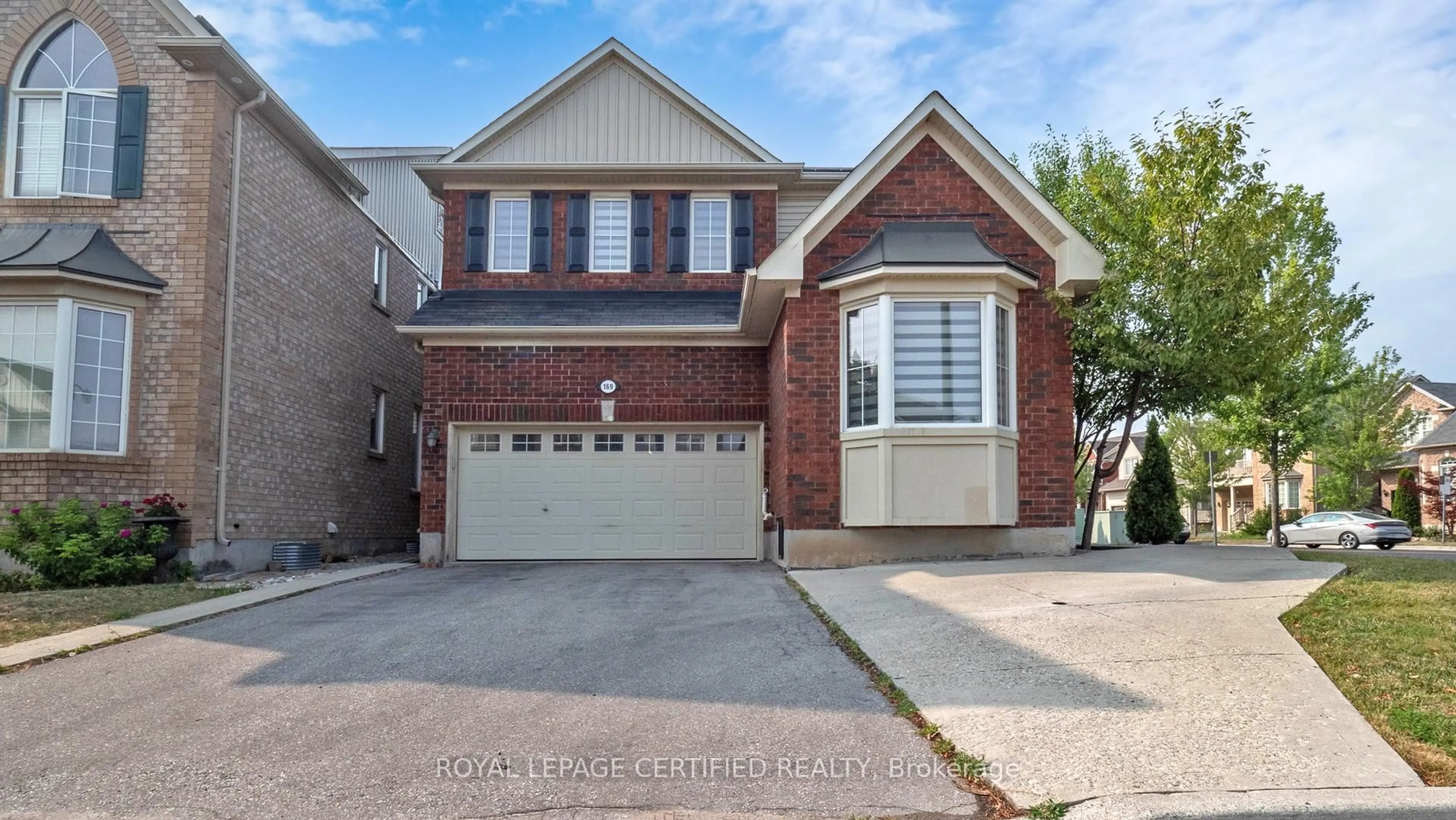 Home with brick exterior material, street for 169 Fennamore Terr, Milton Ontario L9T 0Y3