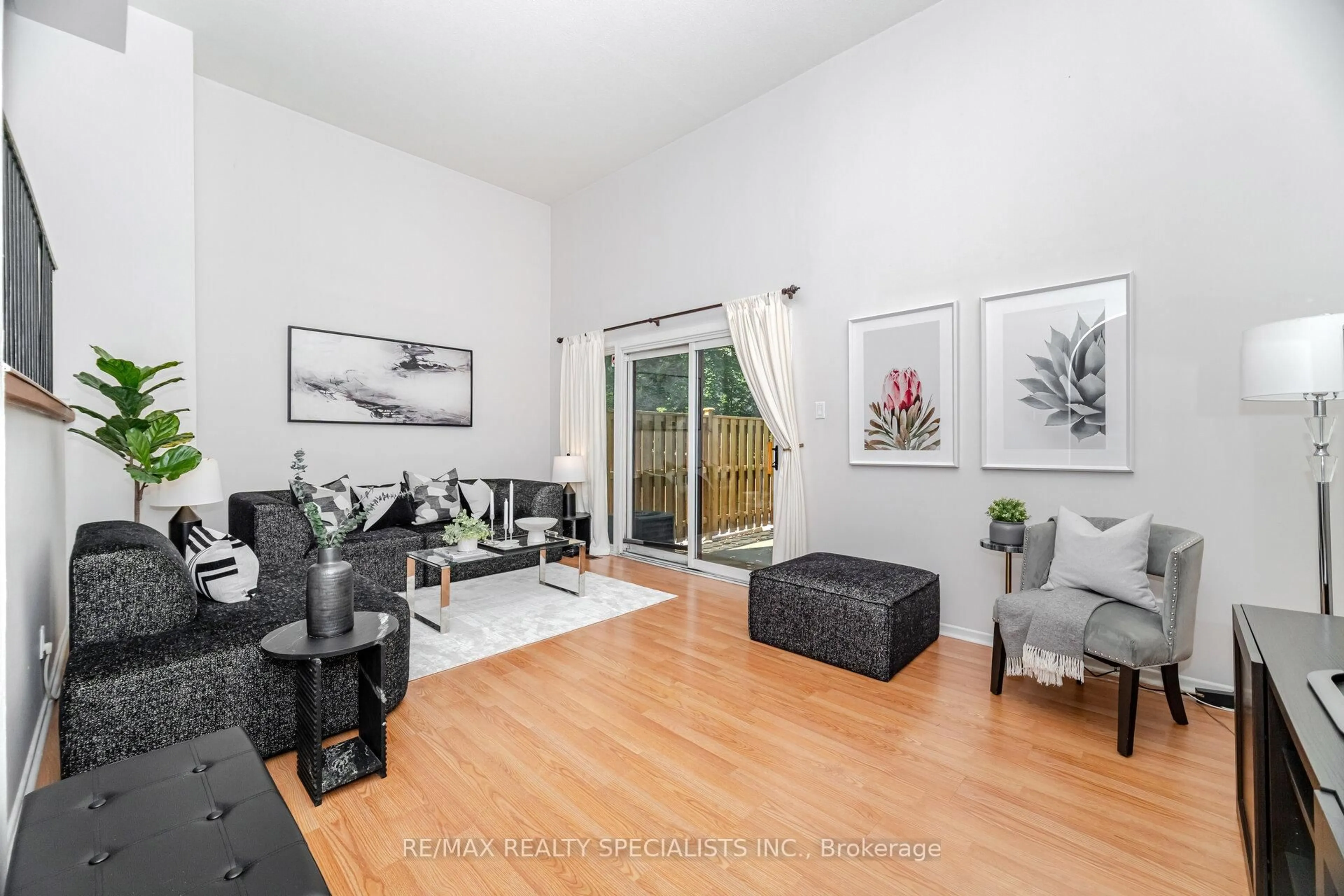 Living room with furniture, wood/laminate floor for 2020 South Millway #74, Mississauga Ontario L5L 1K2