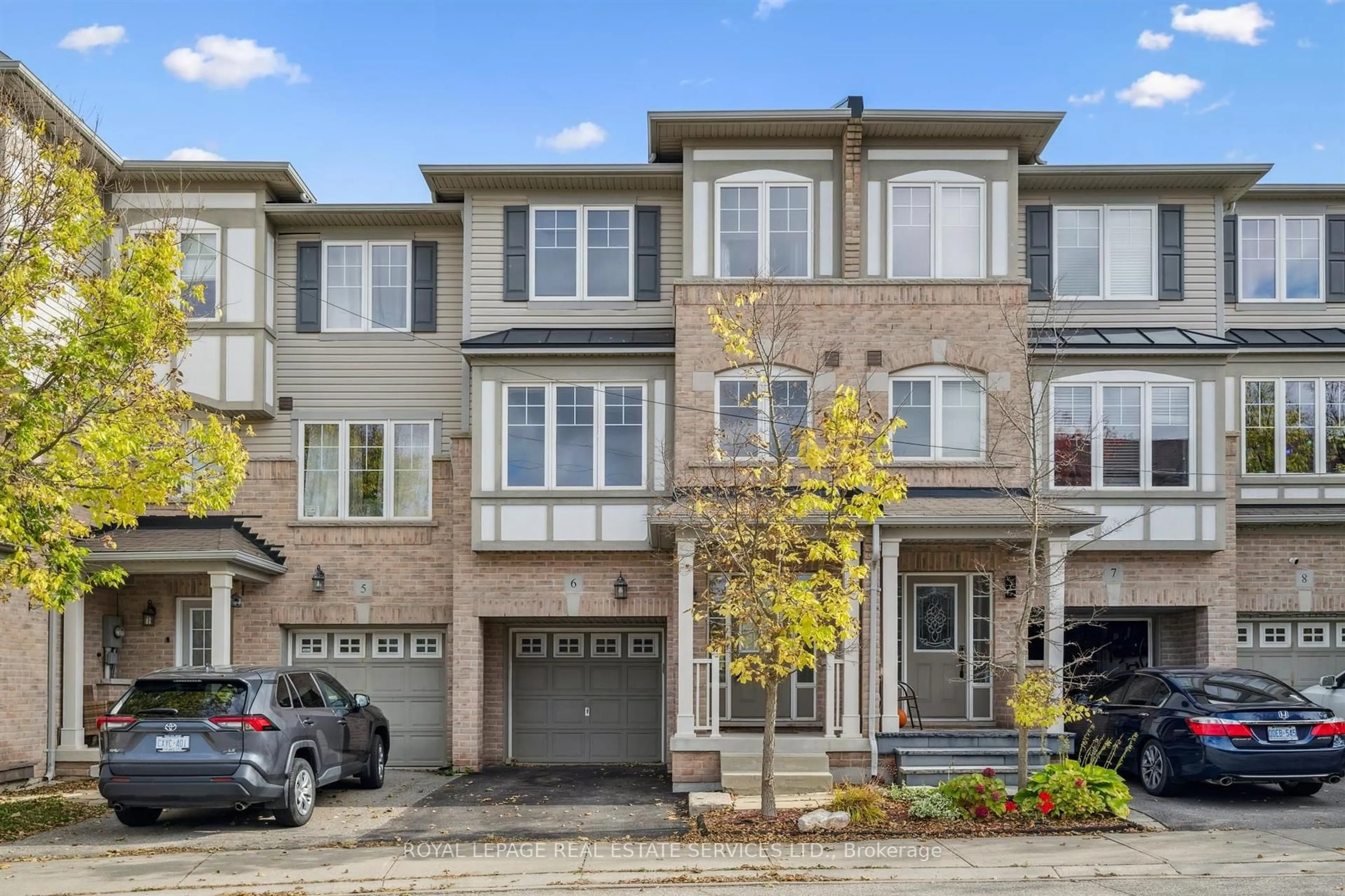Home with brick exterior material, street for 2006 Trawden Way #6, Oakville Ontario L6M 0M1