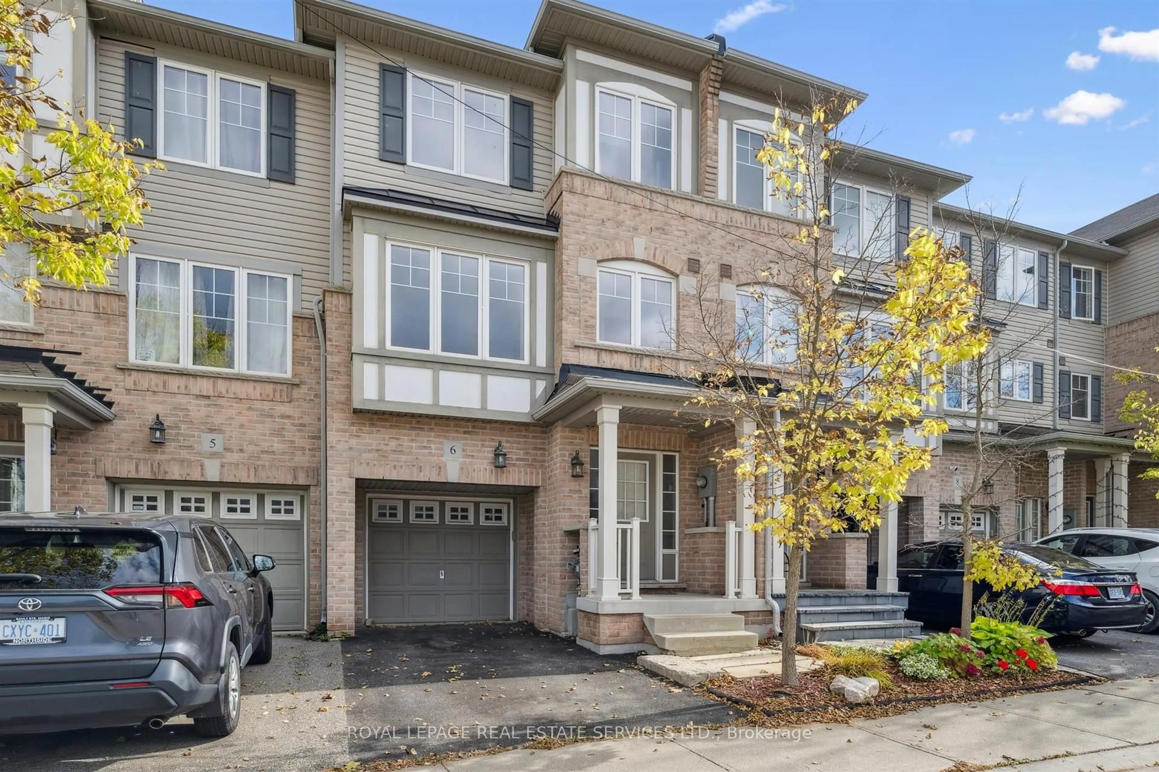 Home with brick exterior material, street for 2006 Trawden Way #6, Oakville Ontario L6M 0M1