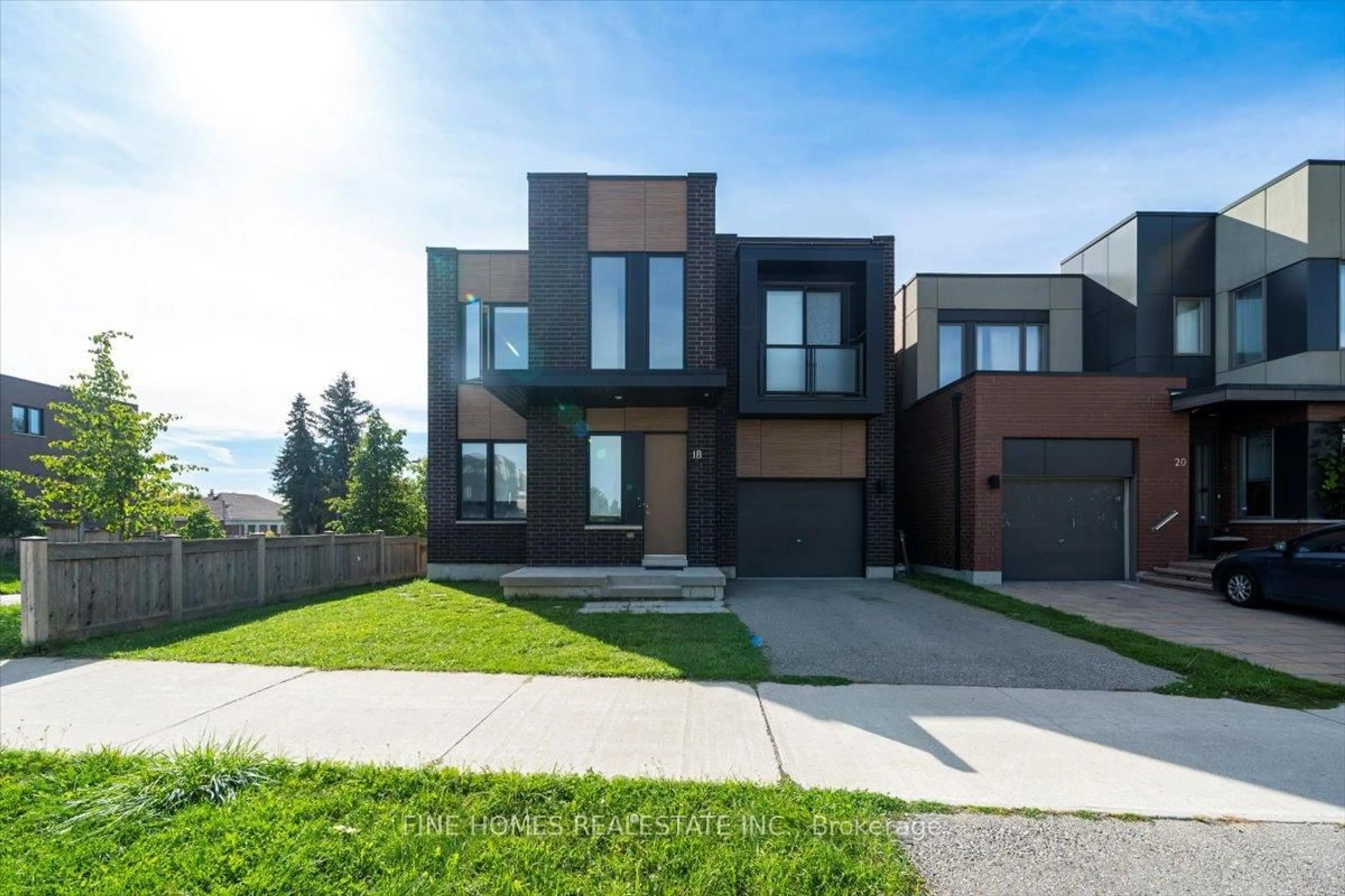 Home with brick exterior material, street for 18 STANLEY GREENE Blvd, Toronto Ontario M3K 0A9