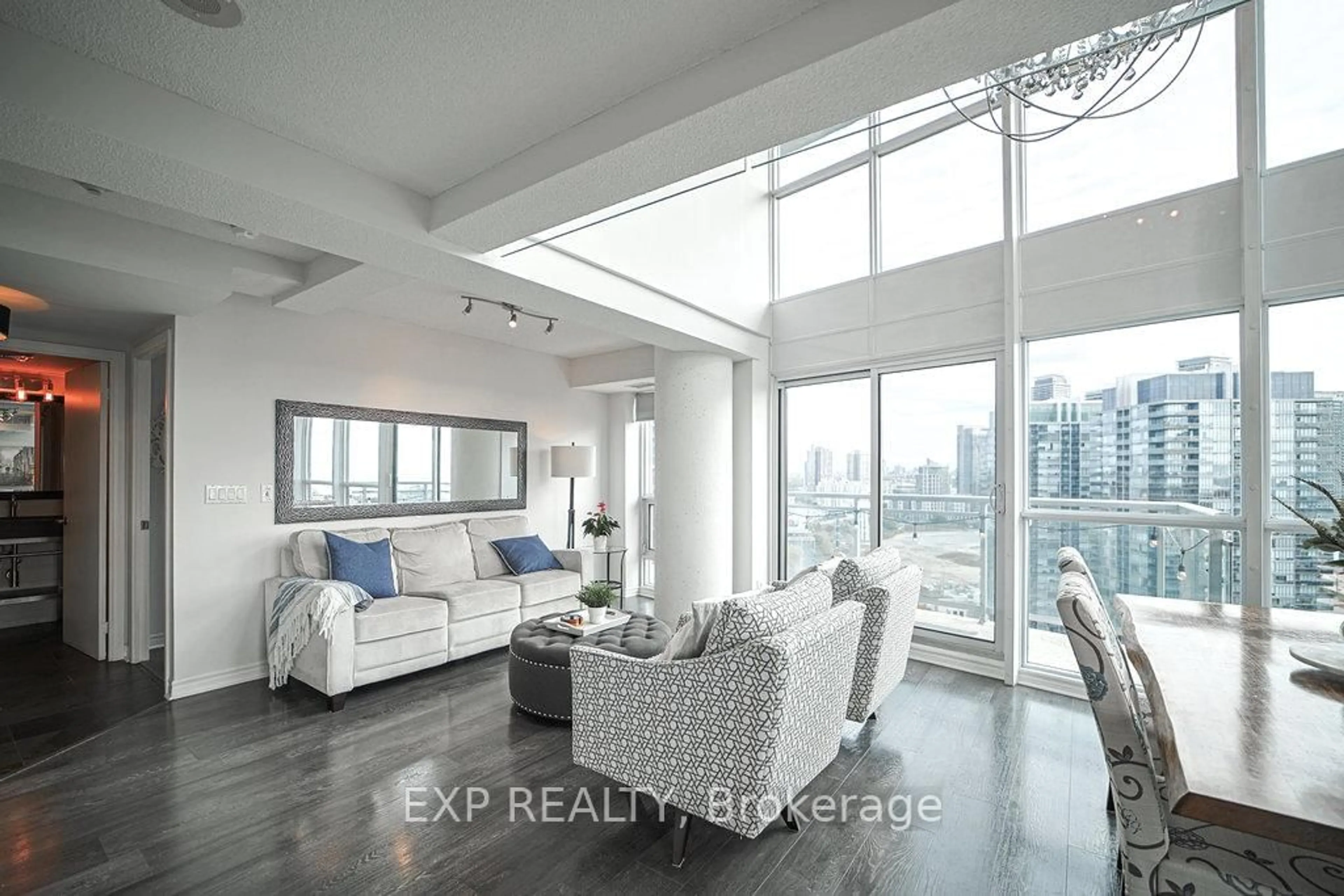 Living room with furniture, unknown for 155 Legion Rd #2304, Toronto Ontario M8Y 0A7