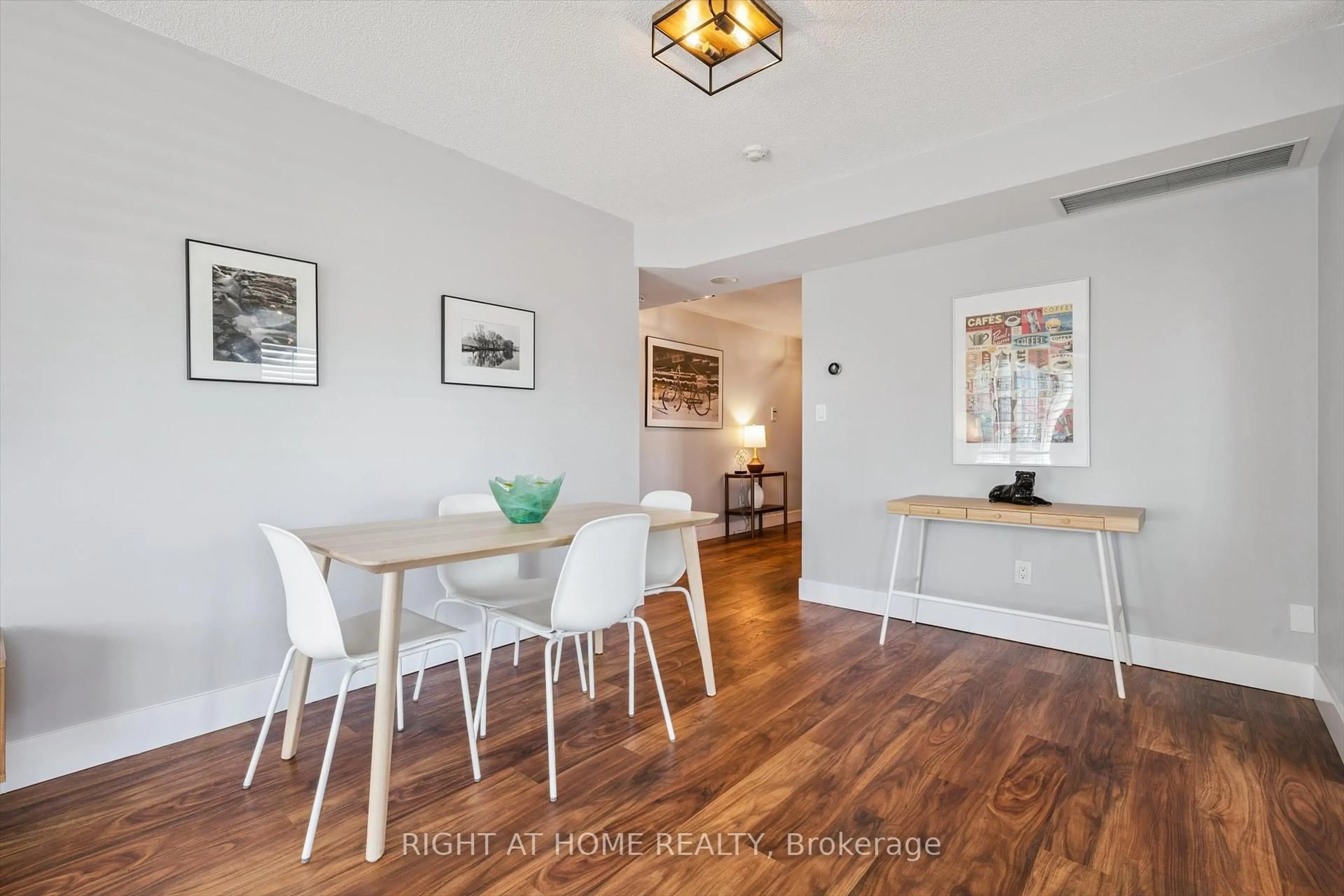 Dining room, wood/laminate floor for 190 Manitoba St #304, Toronto Ontario M8Y 3Y8