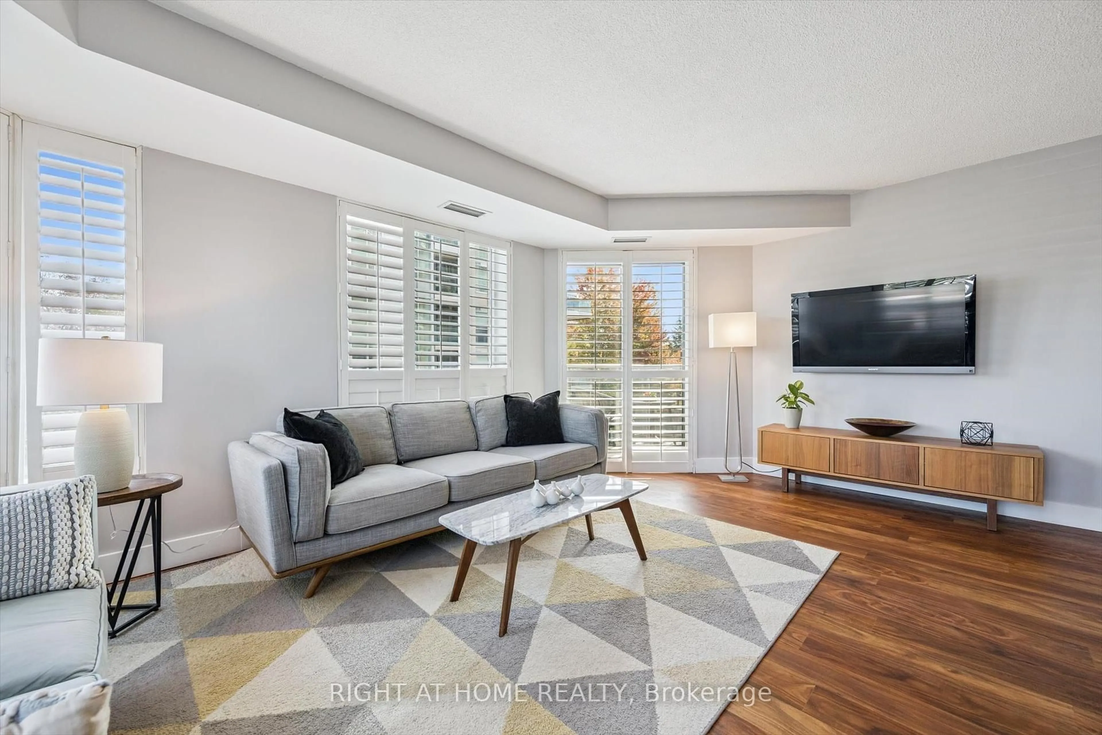 Living room with furniture, unknown for 190 Manitoba St #304, Toronto Ontario M8Y 3Y8