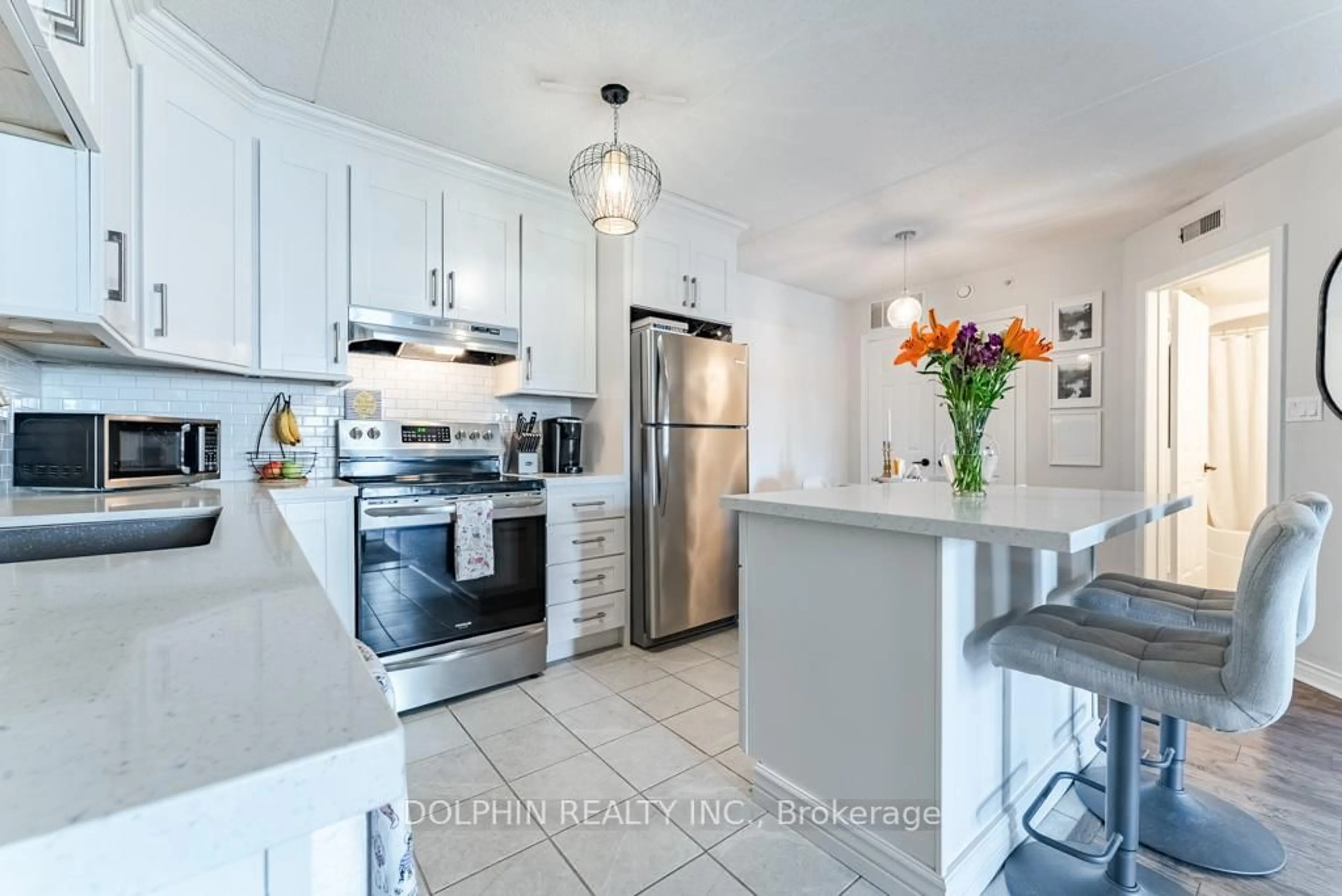 Open concept kitchen, ceramic/tile floor for 4005 Kilmer Dr #204, Burlington Ontario L7M 4M2