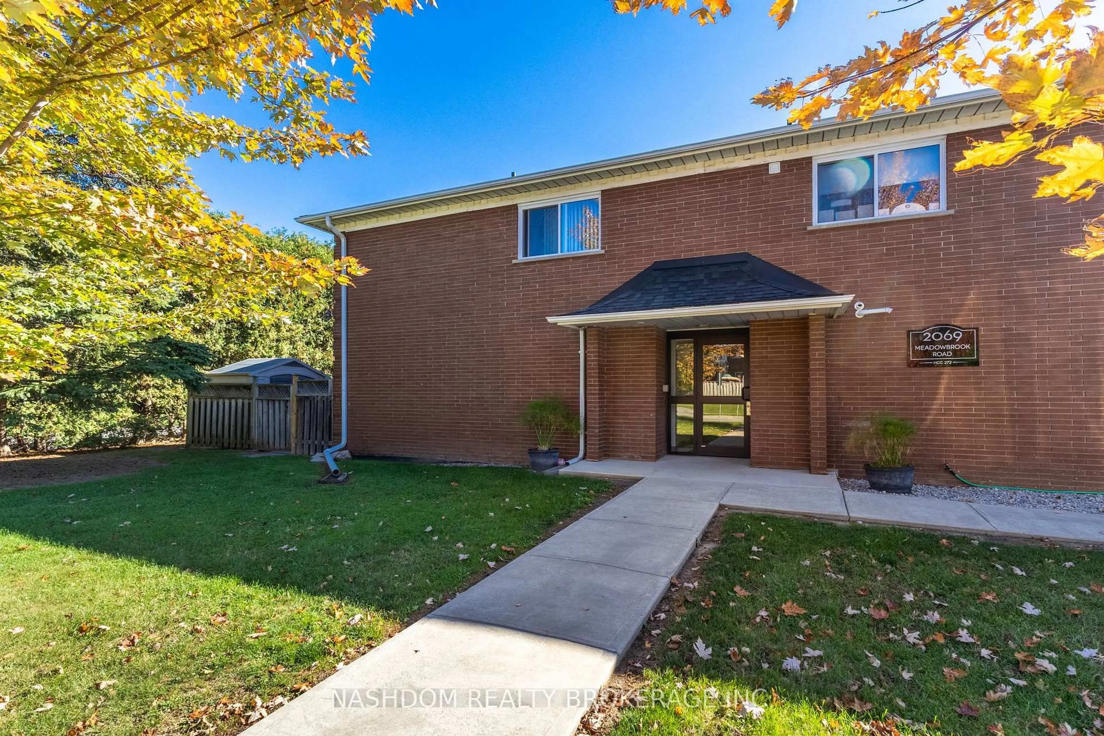 Home with brick exterior material, street for 2069 Meadowbrook Rd #10, Burlington Ontario L7P 2A3