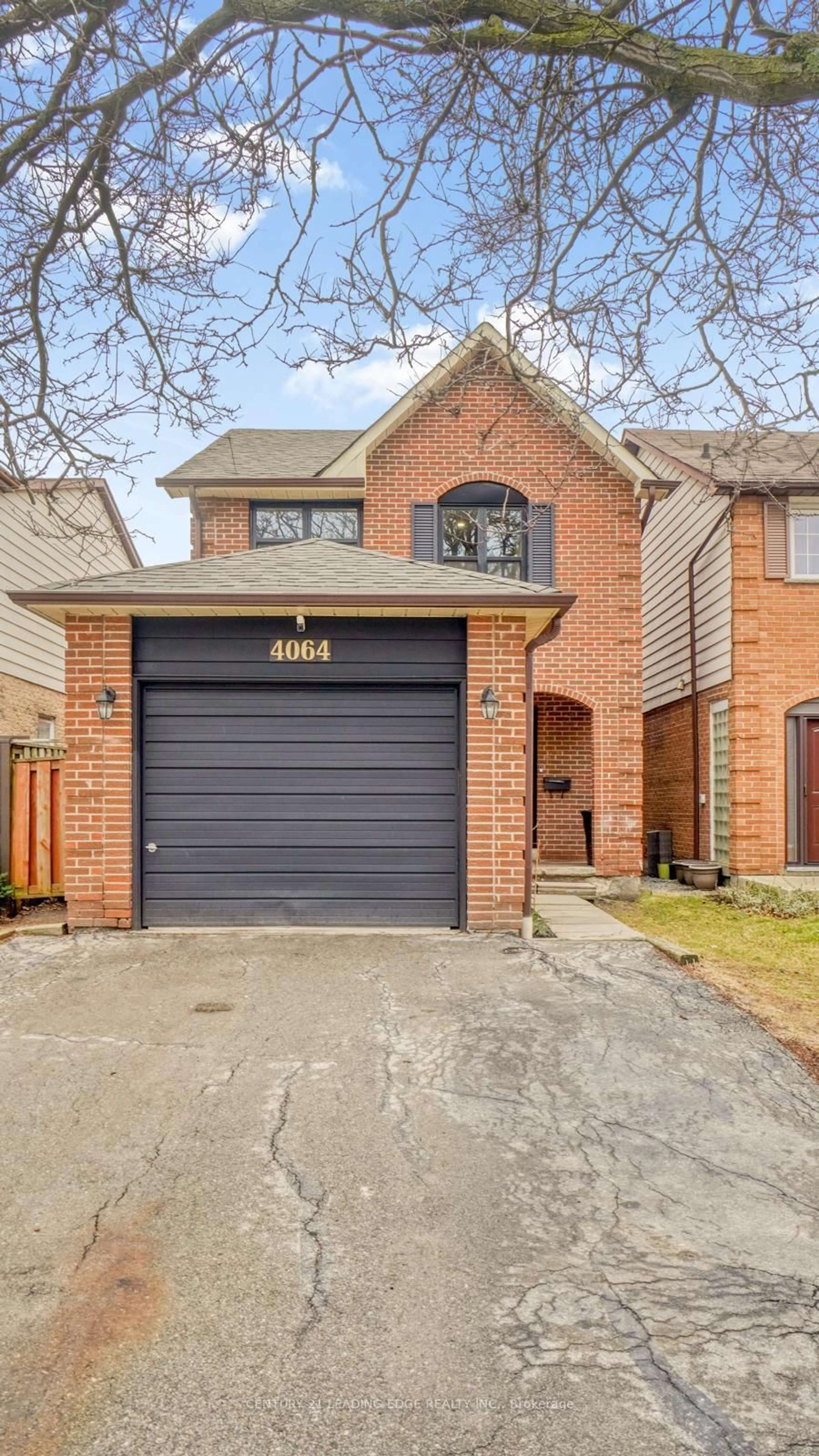 Home with brick exterior material, street for 4064 Teakwood Dr, Mississauga Ontario L5C 3L5