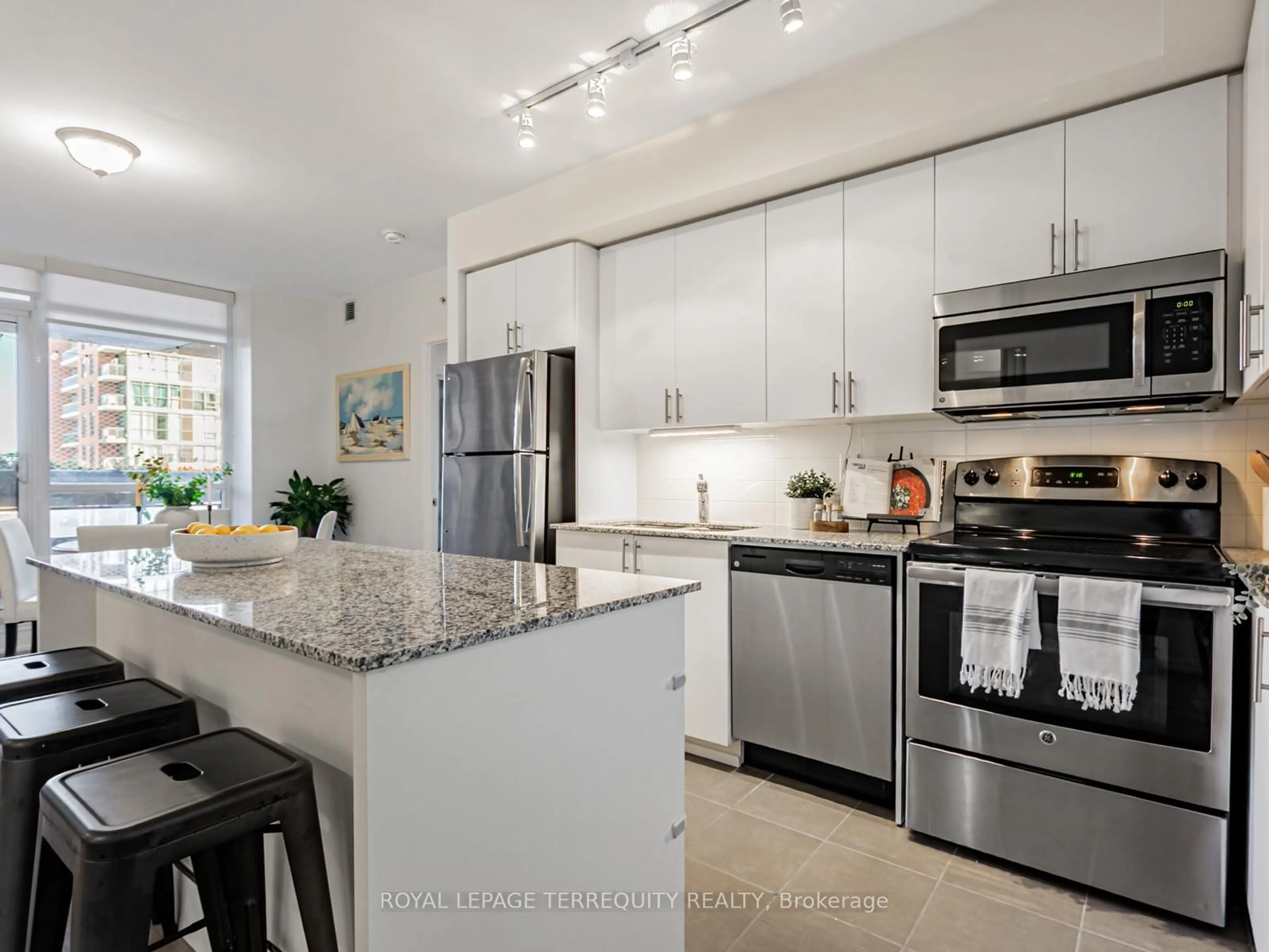 Open concept kitchen, ceramic/tile floor for 830 Lawrence Ave #626, Toronto Ontario M6A 0B6