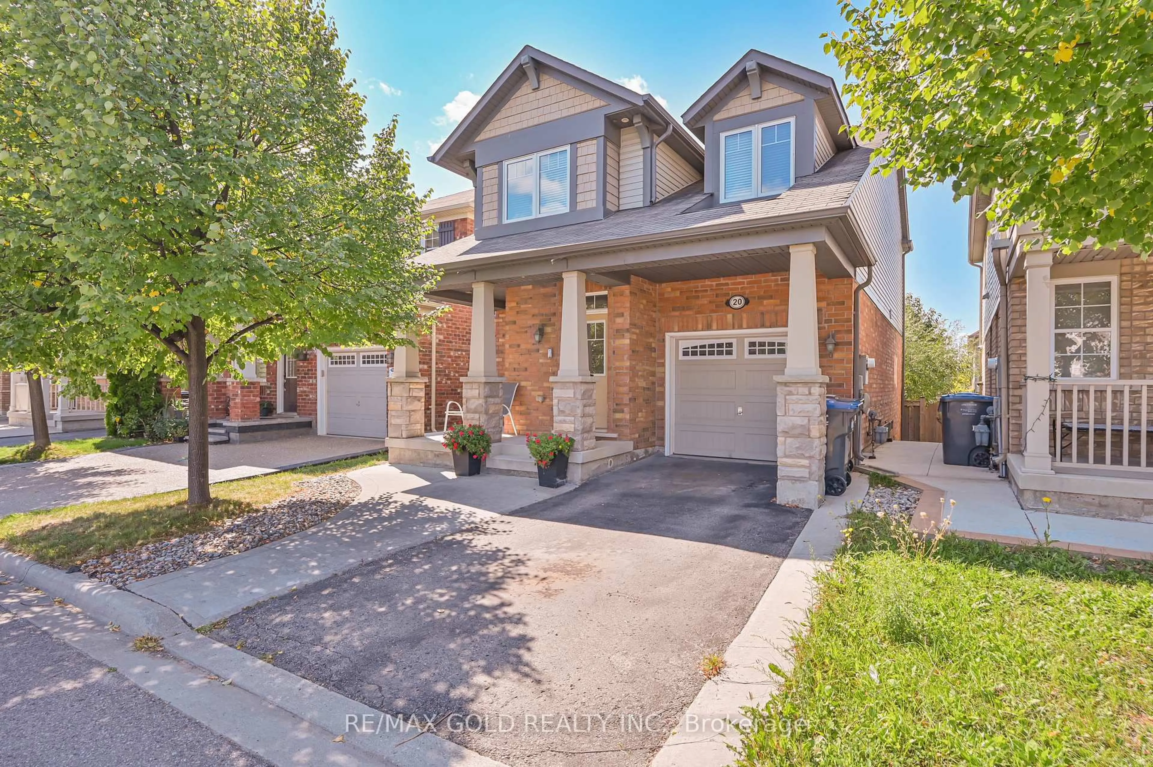 Home with brick exterior material, street for 20 Meadowcrest Lane, Brampton Ontario L7A 0T8