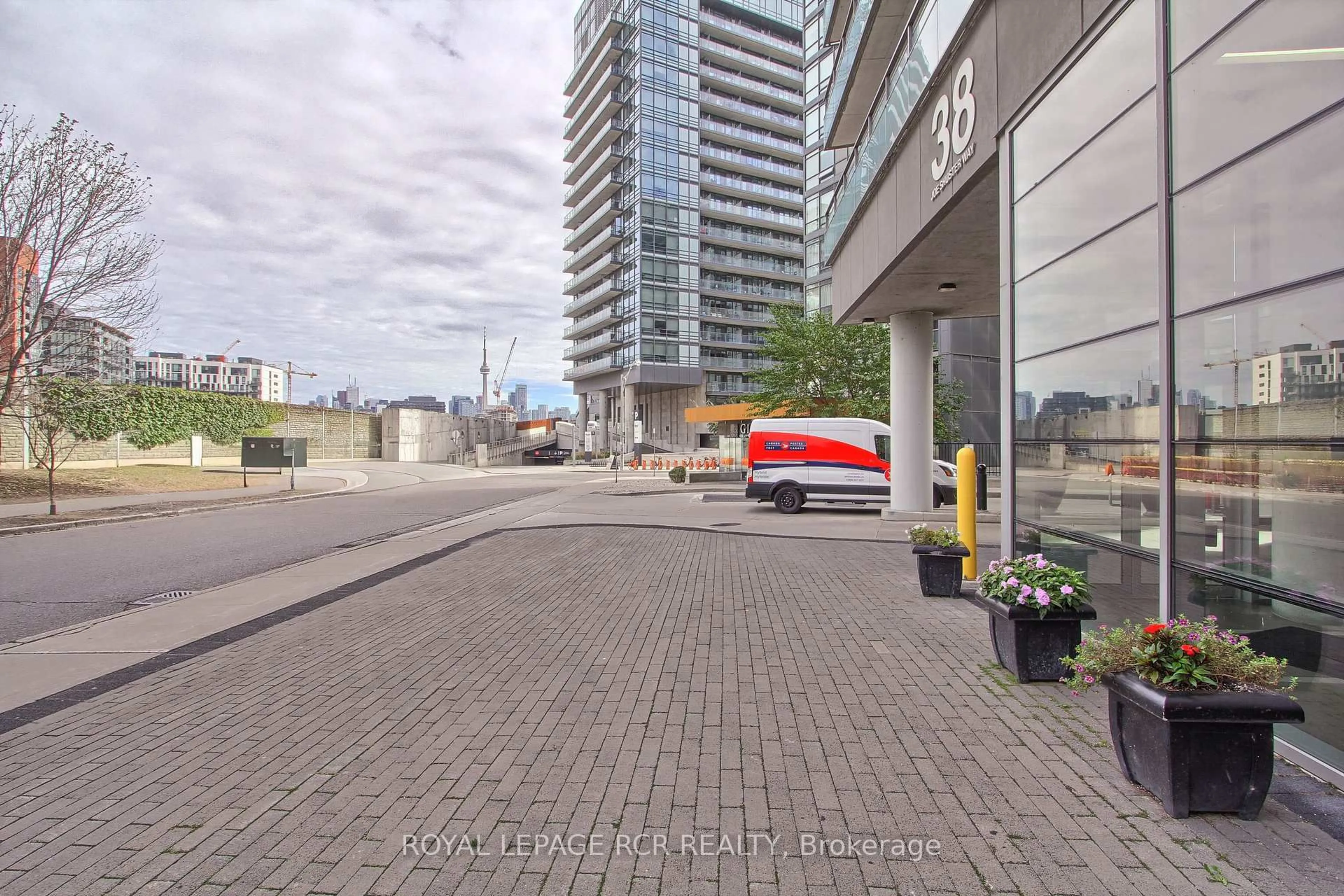 A pic from outside/outdoor area/front of a property/back of a property/a pic from drone, street for 38 Joe Shuster Way #623, Toronto Ontario M6K 0A5