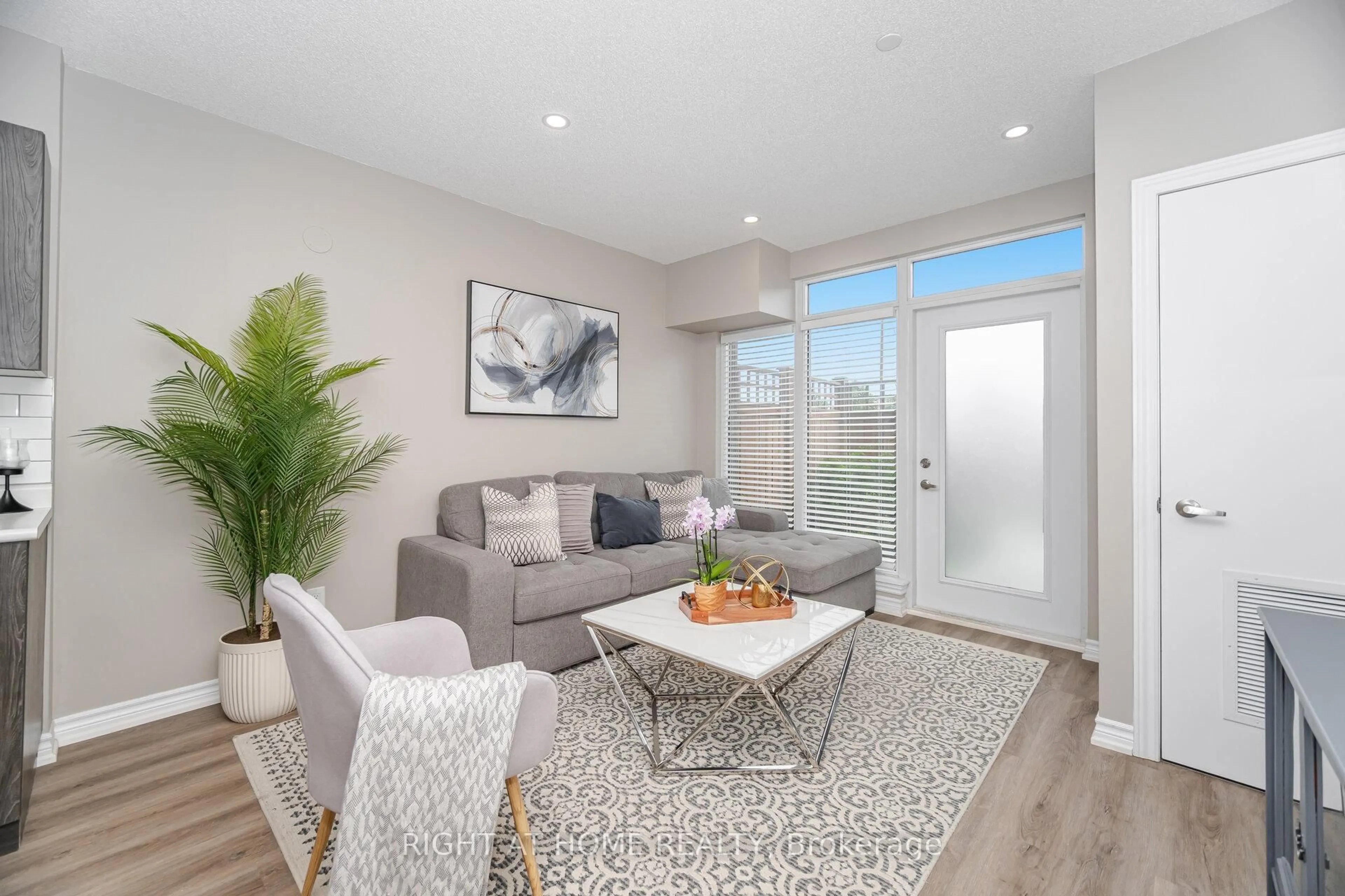 Living room with furniture, unknown for 716 Main St #101, Milton Ontario L9T 3P6