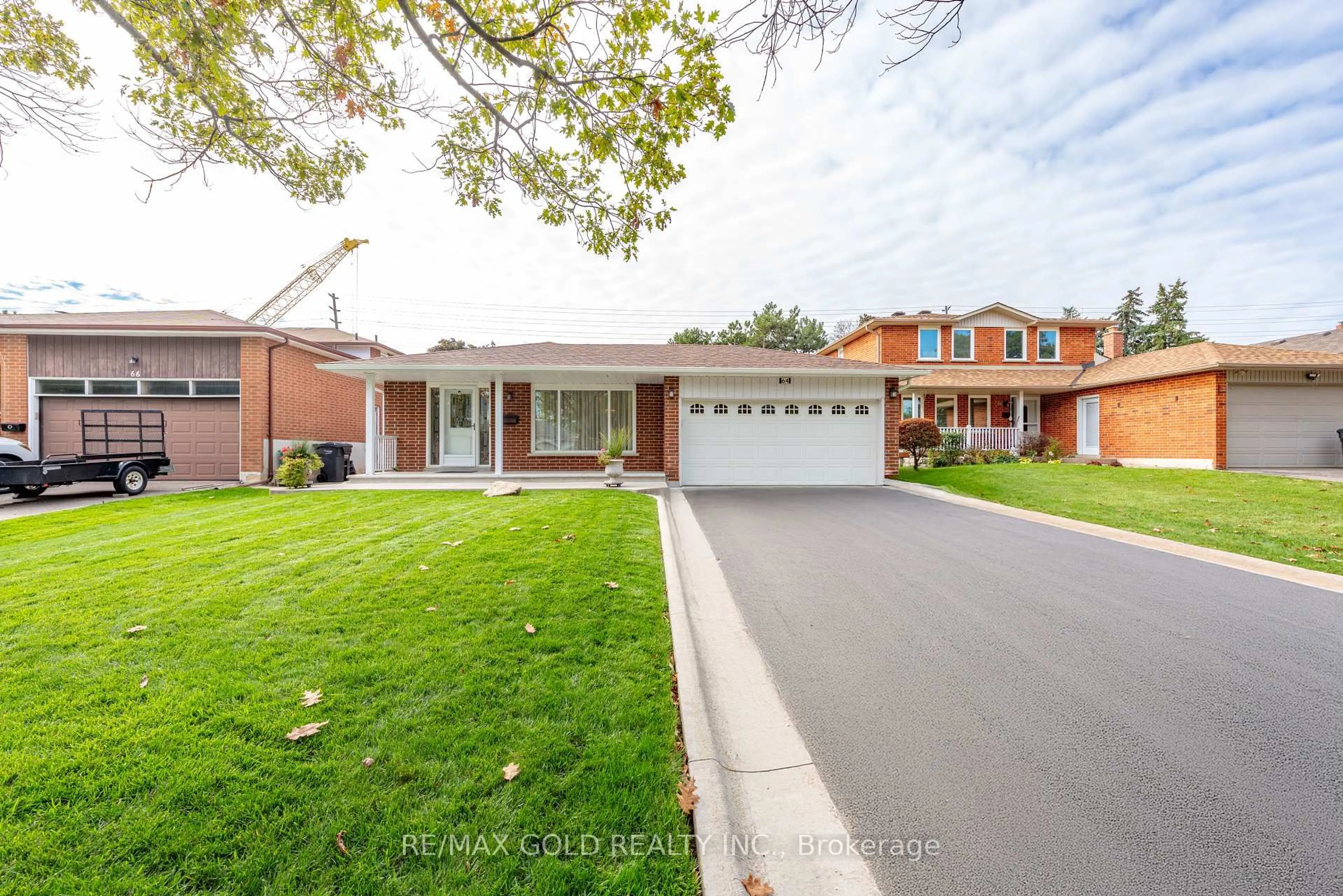 Home with brick exterior material, street for 64 Malcolm Cres, Brampton Ontario L6S 3C8