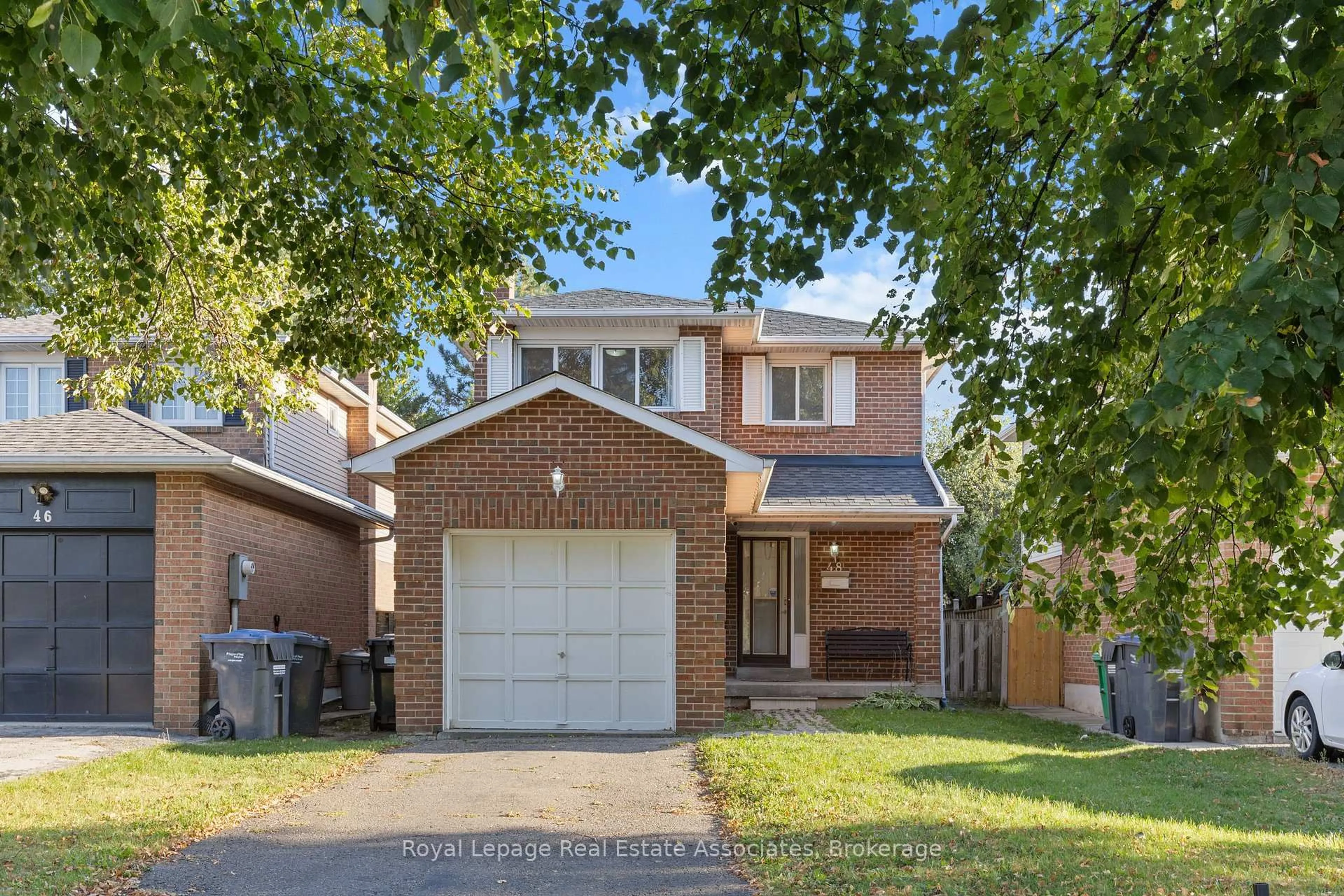 Home with brick exterior material, street for 48 Summertime Crt, Brampton Ontario L6Z 2B4