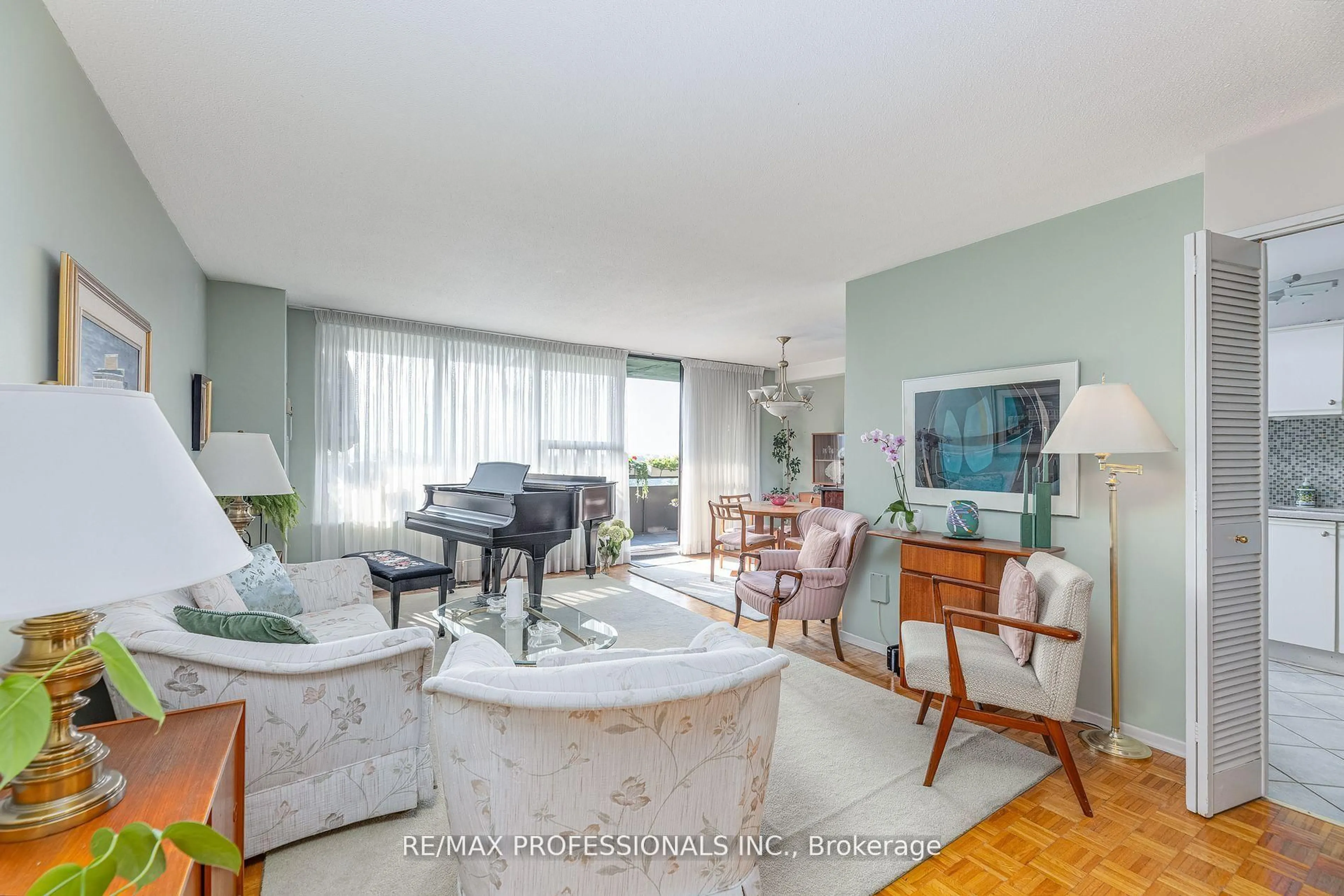 Living room with furniture, unknown for 11 Wincott Dr #907, Toronto Ontario M9R 2R9