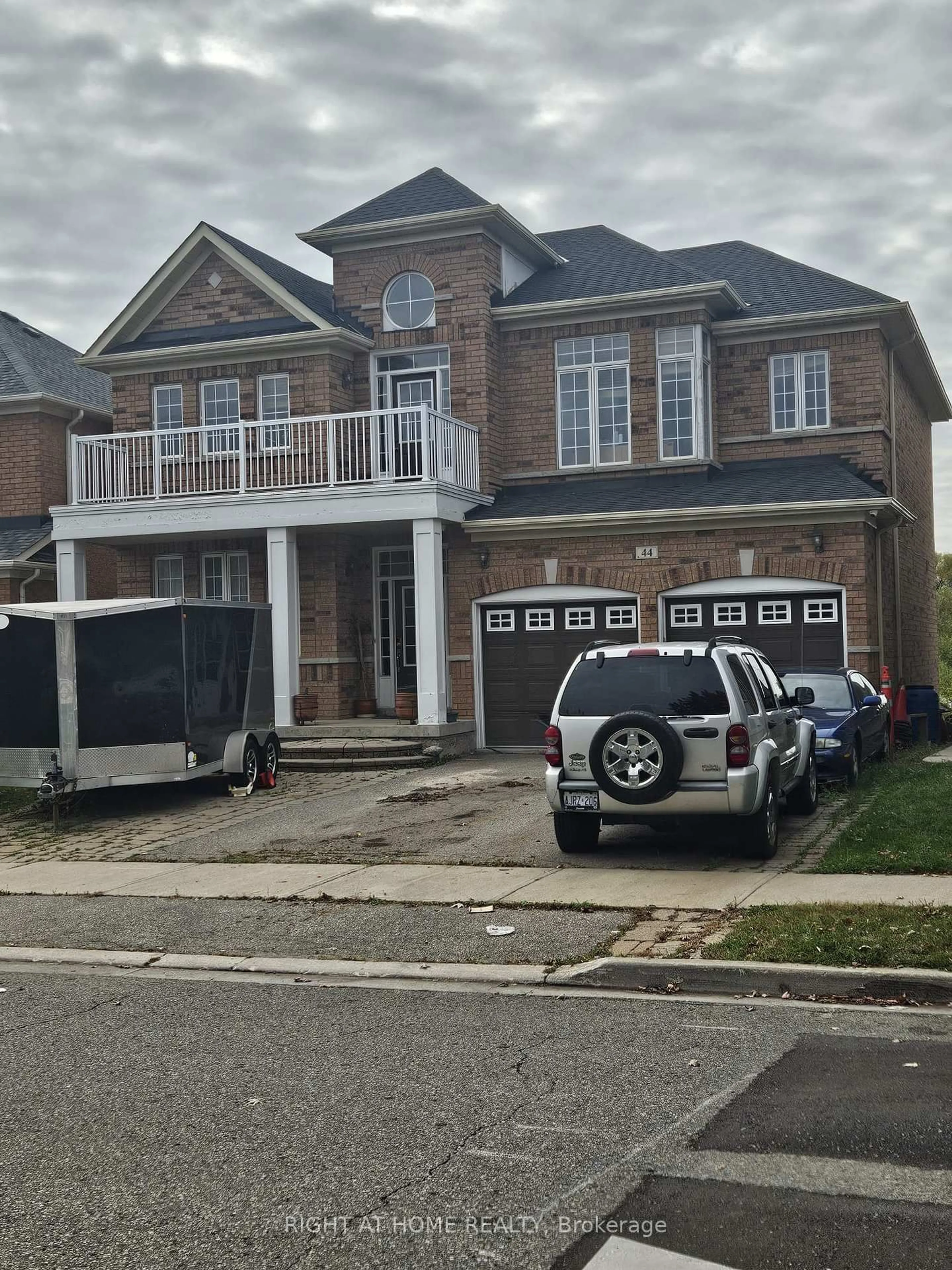 Home with brick exterior material, street for 44 Moldovan Dr, Brampton Ontario L6R 0E4