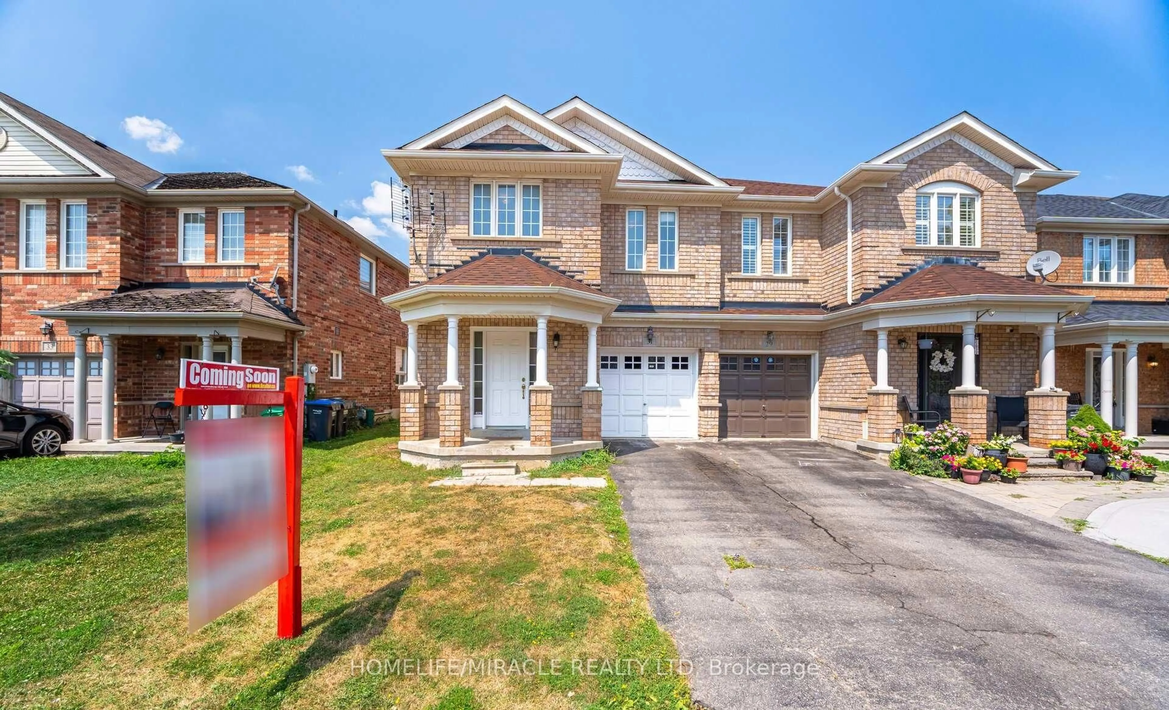 Home with brick exterior material, street for 31 Hollingsworth Circ, Brampton Ontario L7A 0J7