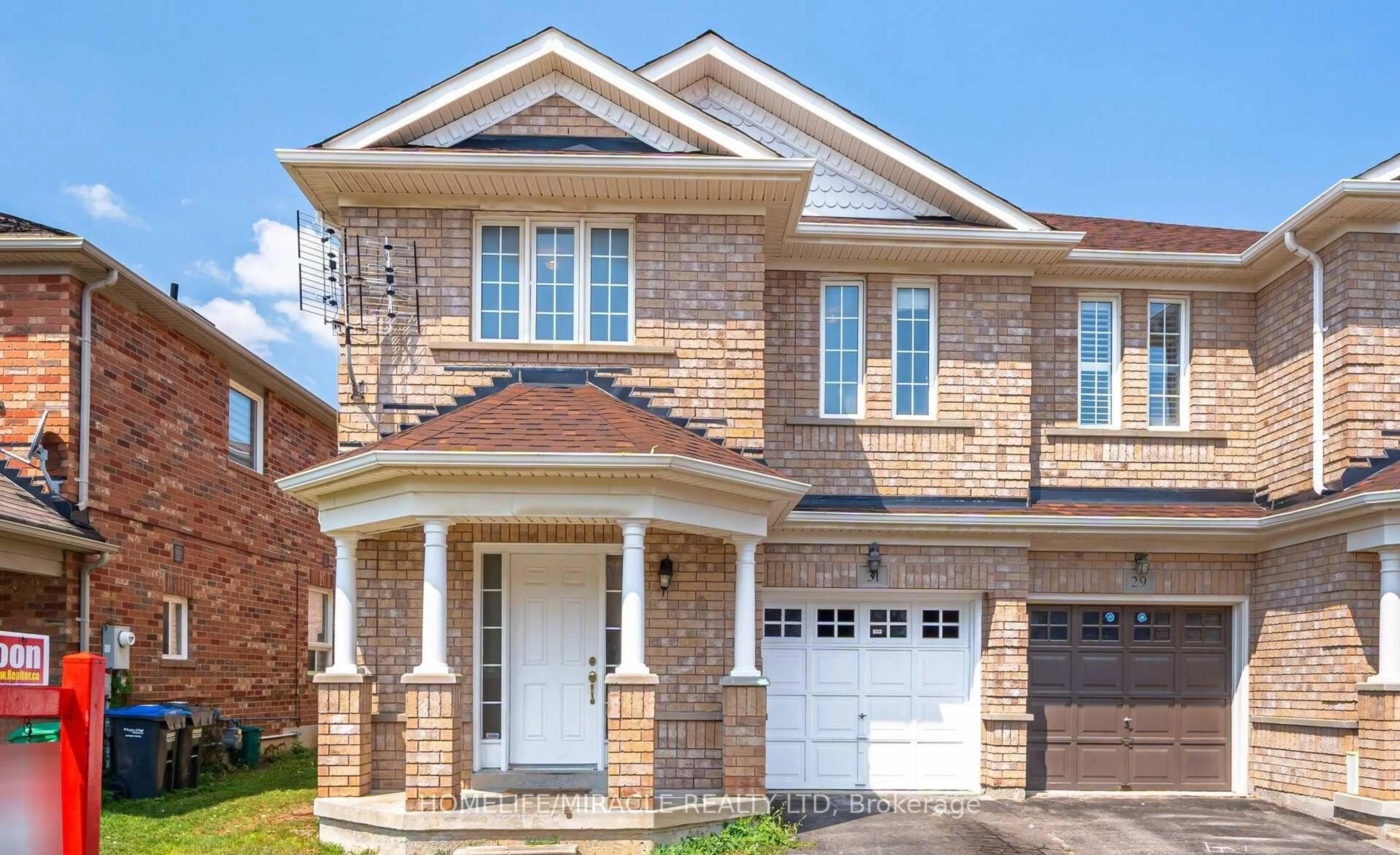 Home with brick exterior material, street for 31 Hollingsworth Circ, Brampton Ontario L7A 0J7