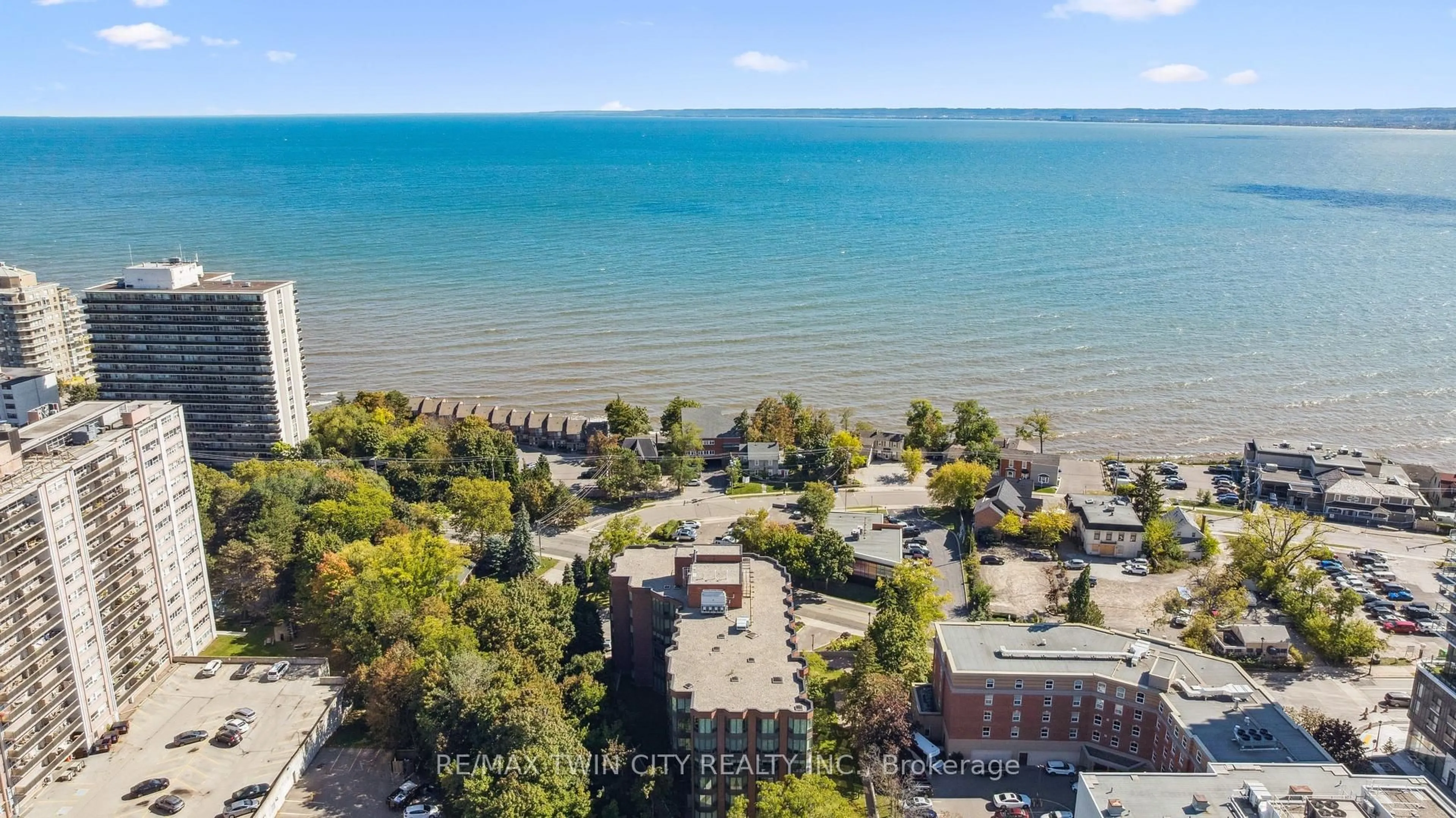 A pic from outside/outdoor area/front of a property/back of a property/a pic from drone, water/lake/river/ocean view for 2121 Lakeshore Rd #401, Burlington Ontario L7R 1C9