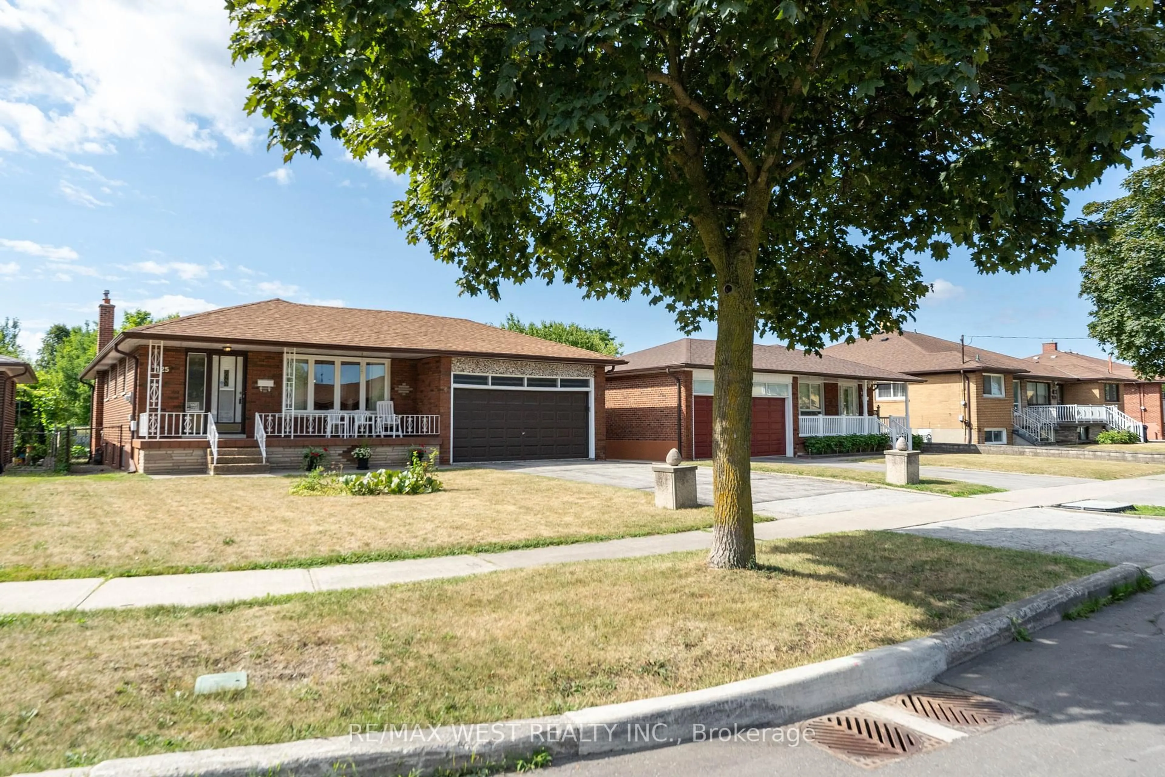Home with brick exterior material, street for 125 Honeywood Rd, Toronto Ontario M3N 1B3