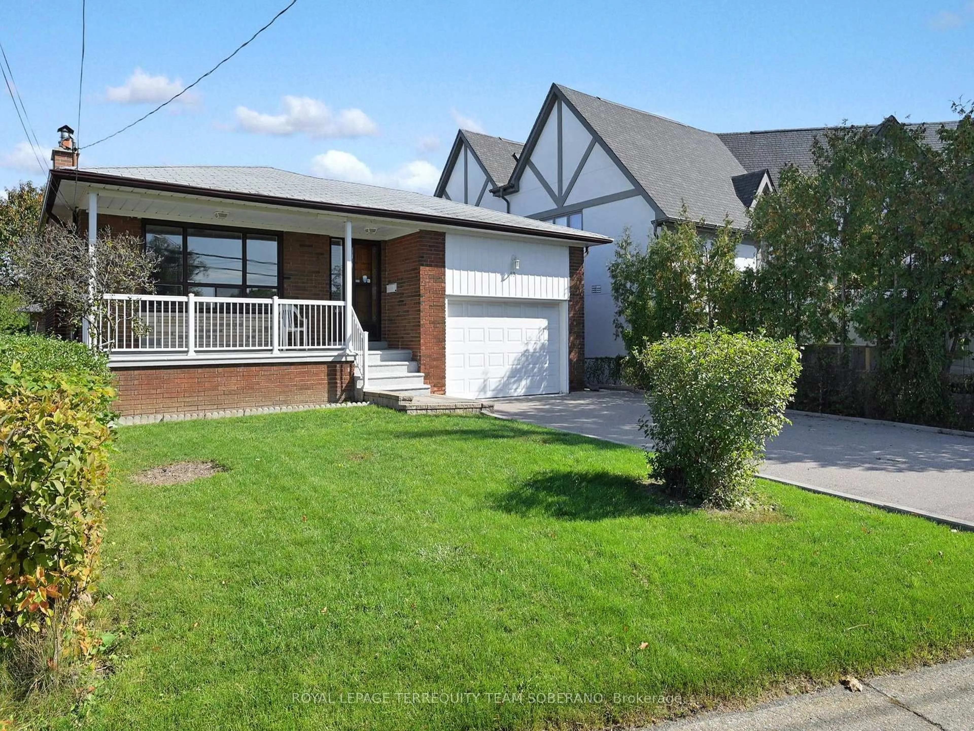 Home with brick exterior material, street for 63 Melbert Rd, Toronto Ontario M9C 3P8