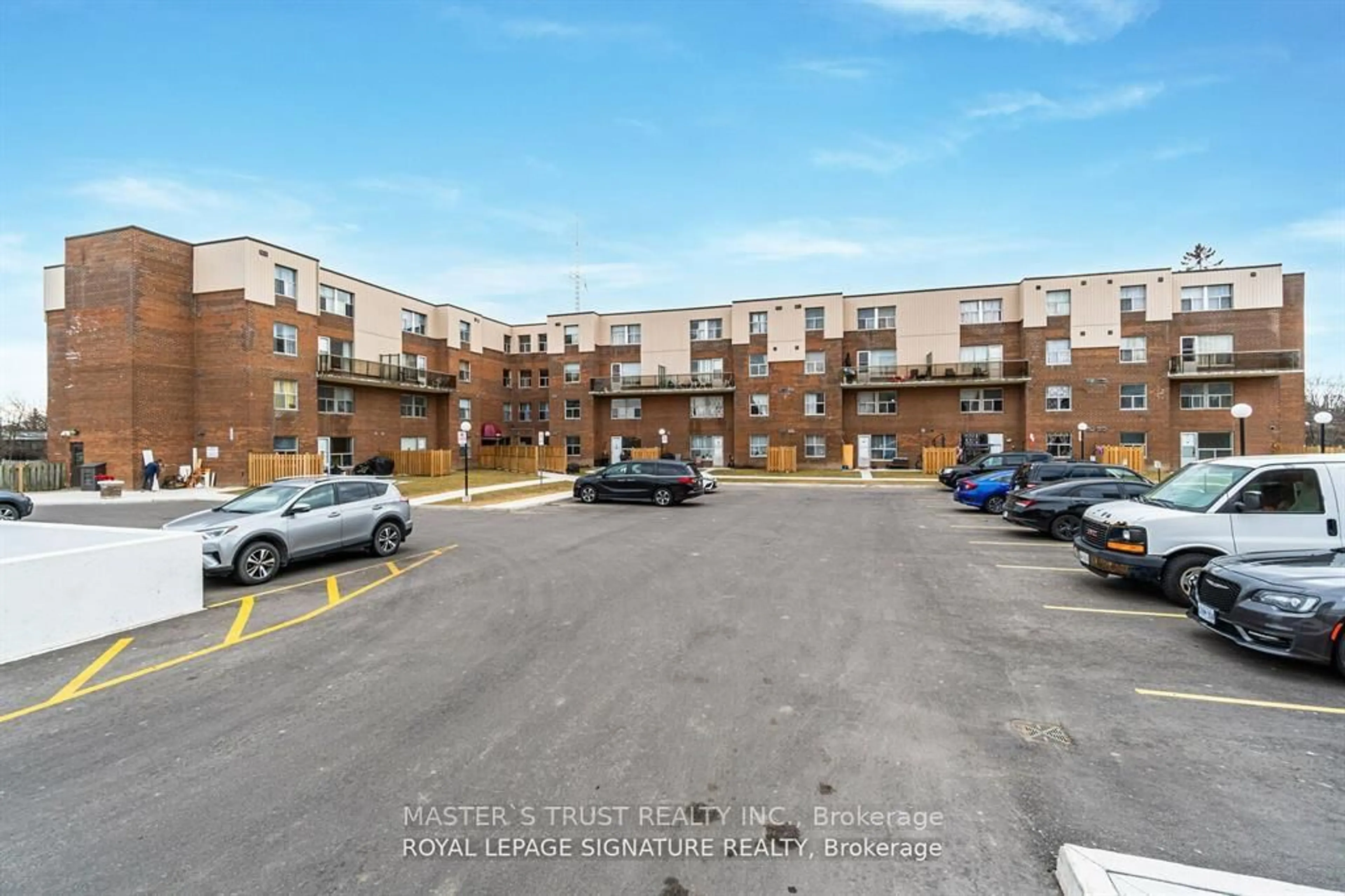 A pic from outside/outdoor area/front of a property/back of a property/a pic from drone, street for 1055 Forestwood Dr #214, Mississauga Ontario L5C 2T8
