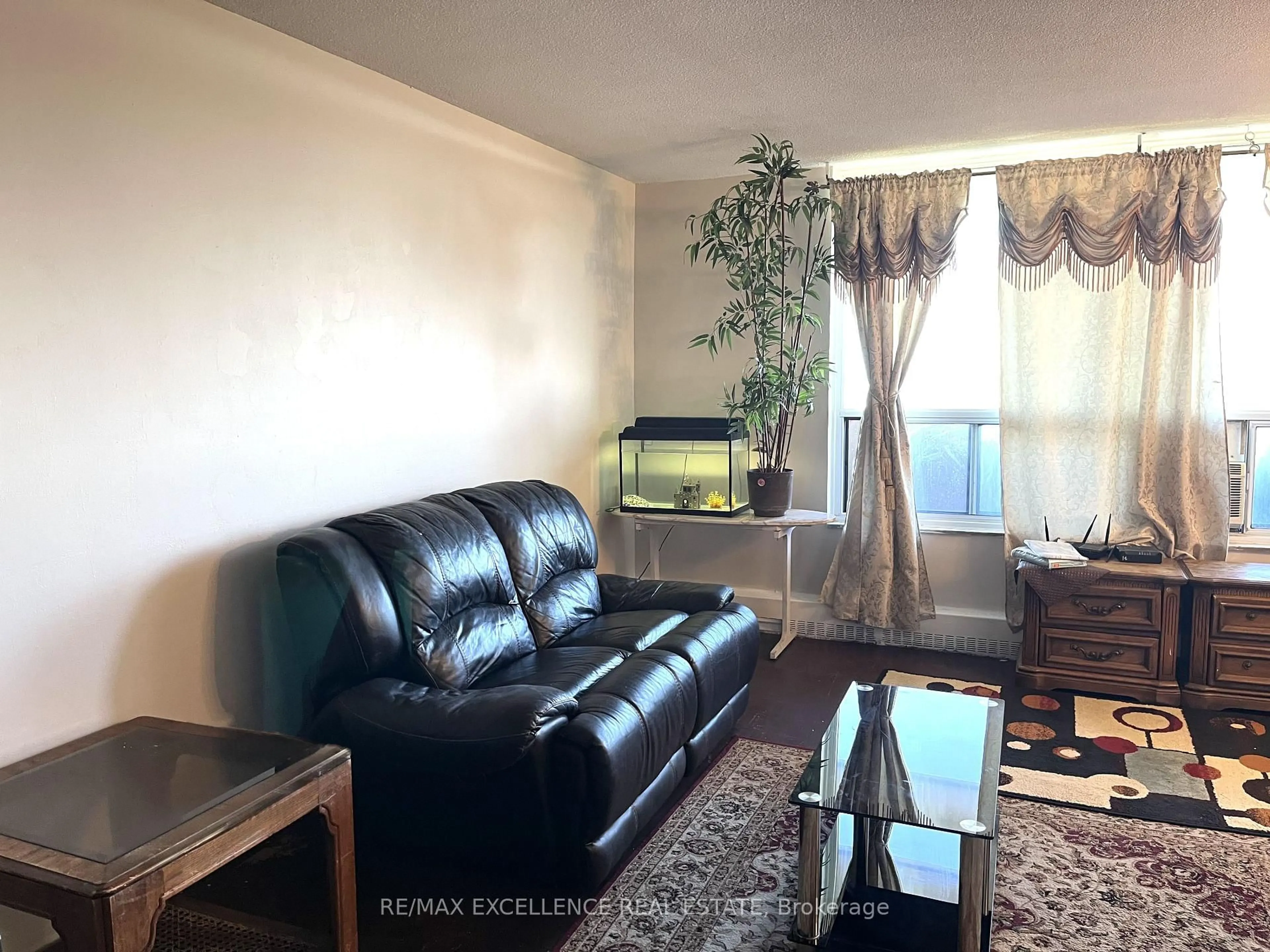 Living room with furniture, unknown for 3390 Weston Rd #2105, Toronto Ontario M9M 2X3