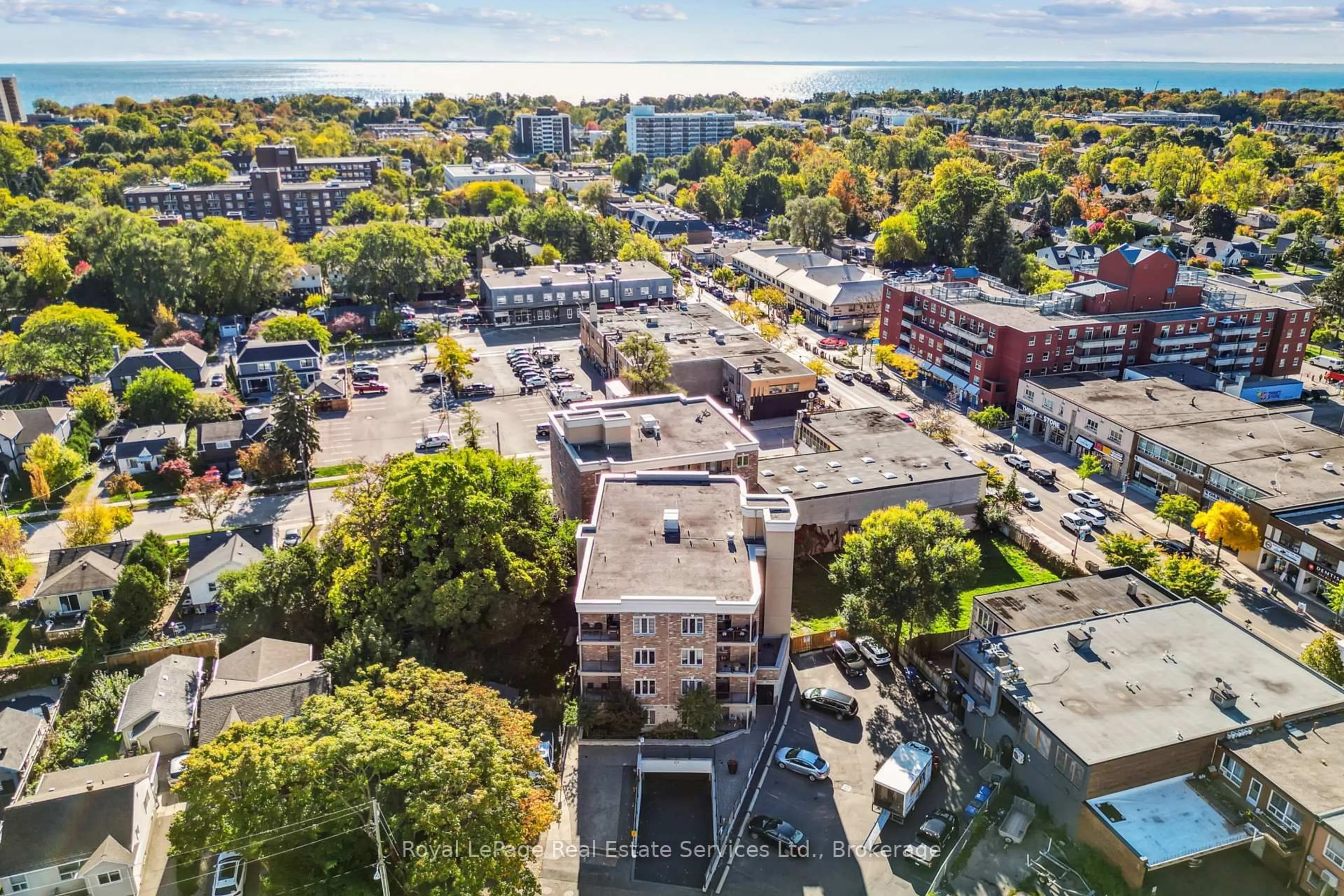 A pic from outside/outdoor area/front of a property/back of a property/a pic from drone, city buildings view from balcony for 70 Stewart St #202, Oakville Ontario L6K 1W5