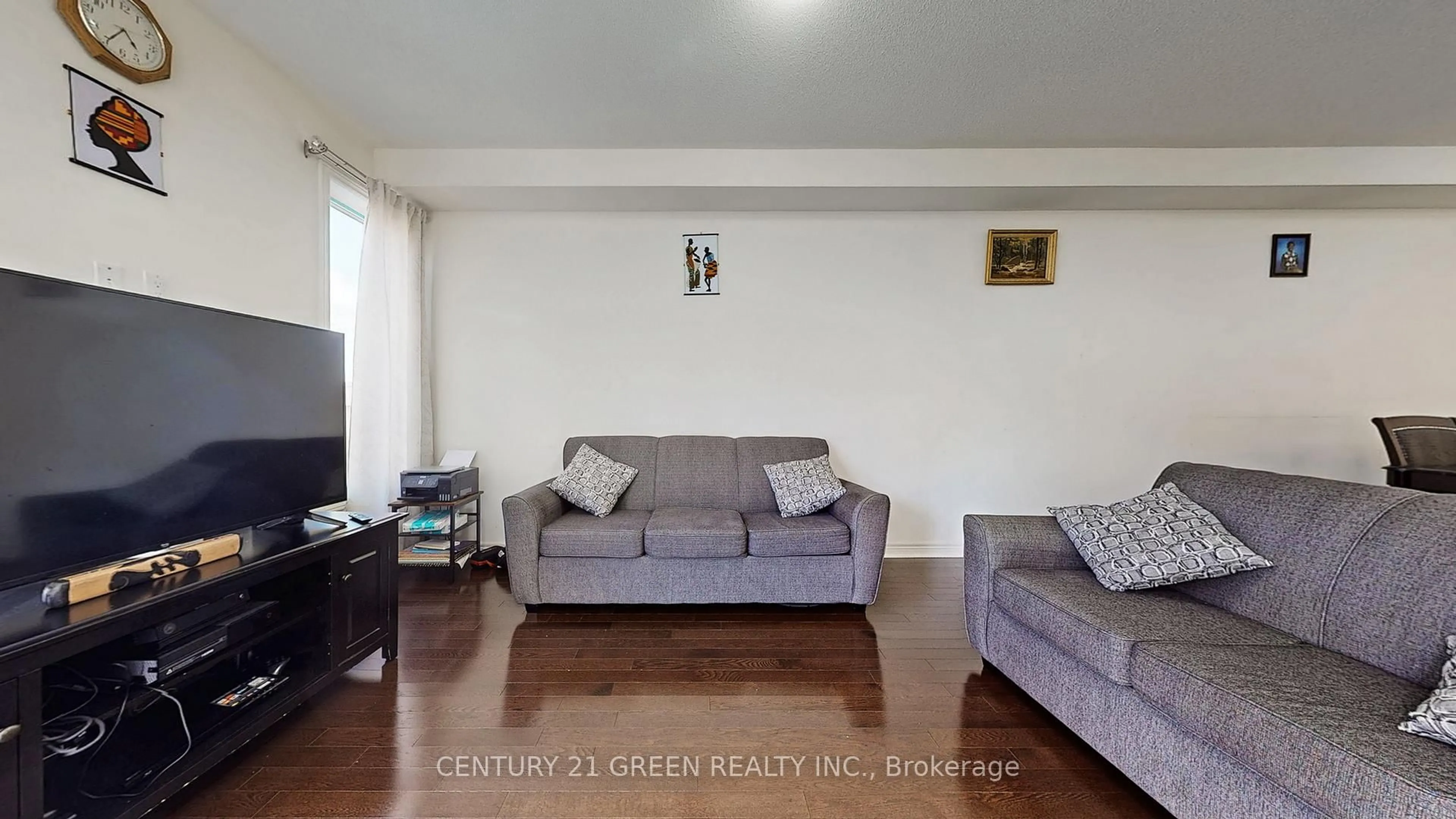 Living room with furniture, wood/laminate floor for 30 Canary Clse, Brampton Ontario L6X 5L1
