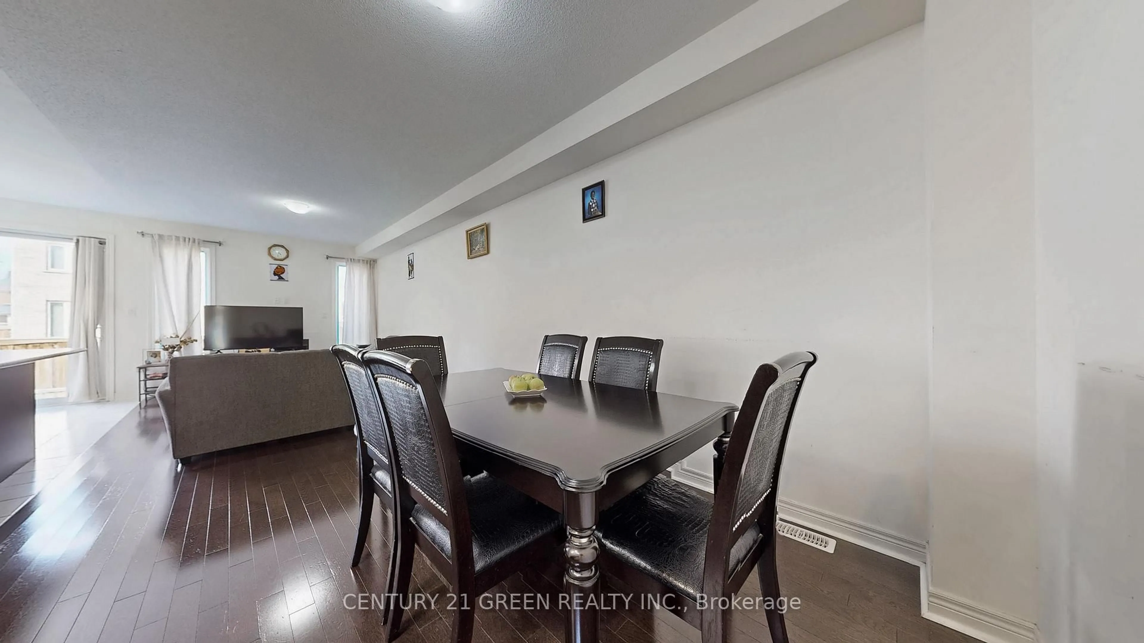Dining room, wood/laminate floor for 30 Canary Clse, Brampton Ontario L6X 5L1