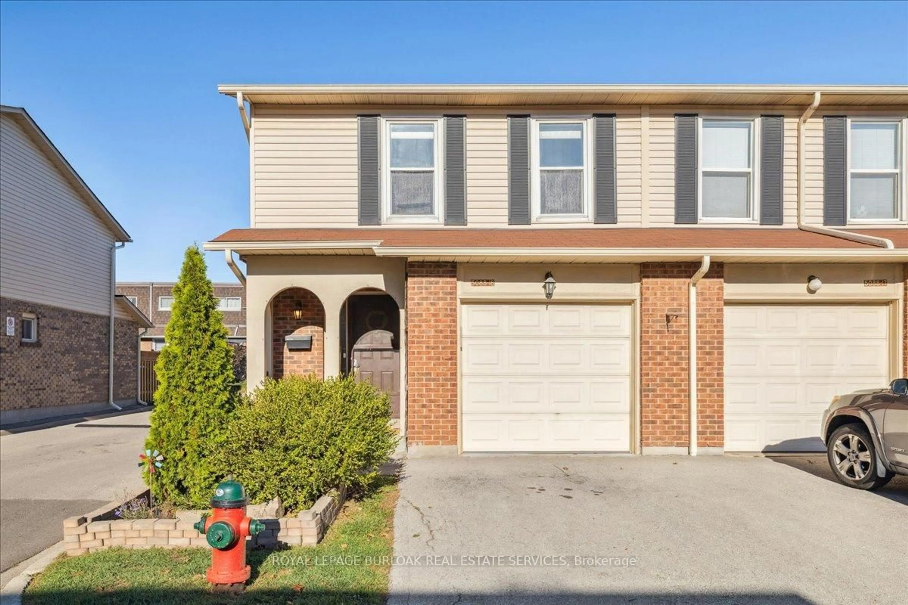 Home with brick exterior material, street for 5088 New St #18, Burlington Ontario L7L 1V1